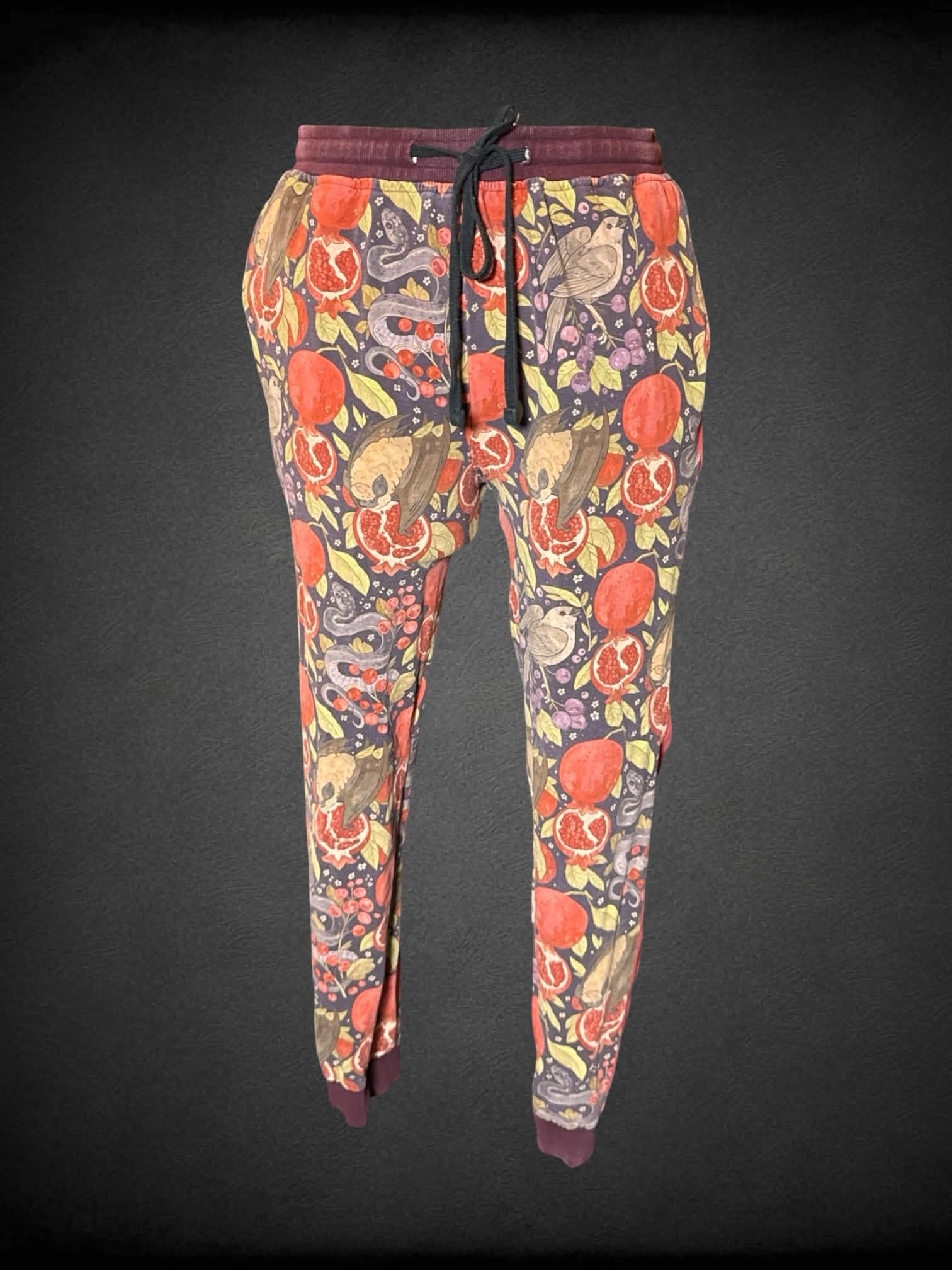 XL Morning Witch purple pants with pomegranate and animal pattern, zipper pockets, and stretch waist