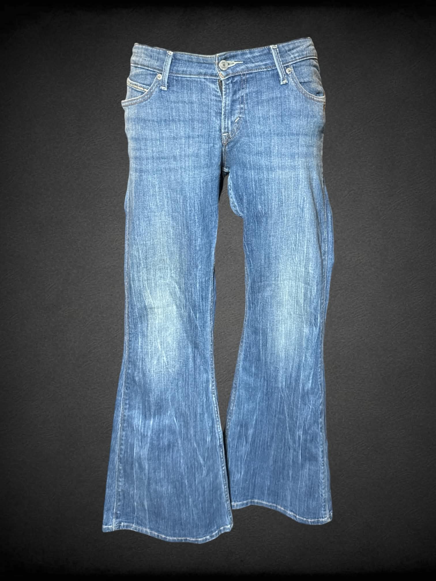 XL Levi’s low-rise blue flare jeans with embroidery on back pockets