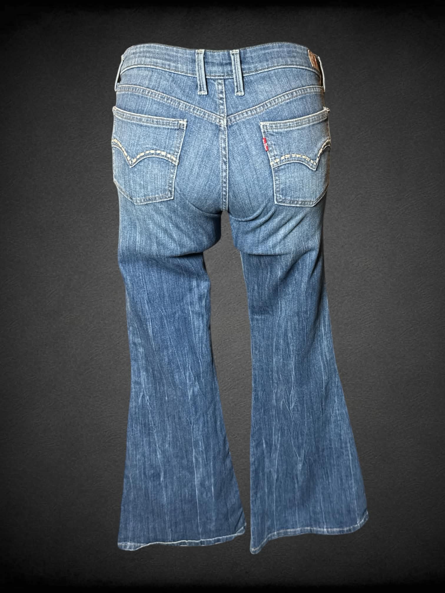 XL Levi’s low-rise blue flare jeans with embroidery on back pockets