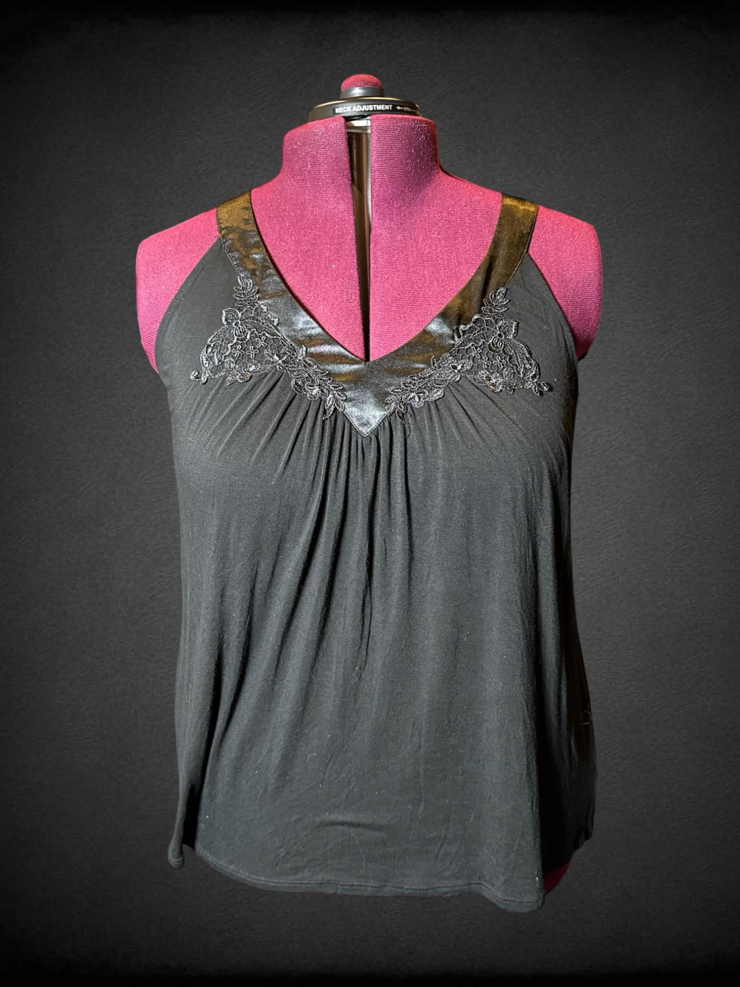 2X Carole Hochman black blouse with “silk-like” neckline, and embroidered floral design on front