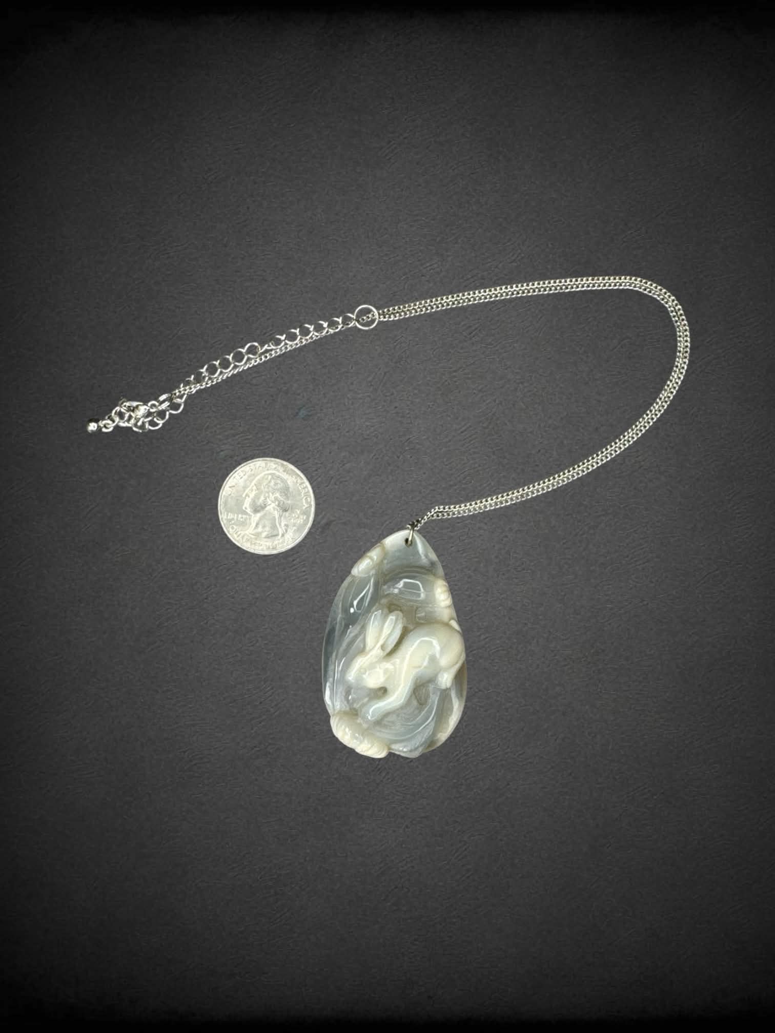 Silver chain necklace with hand-carved bunny stone pendant
