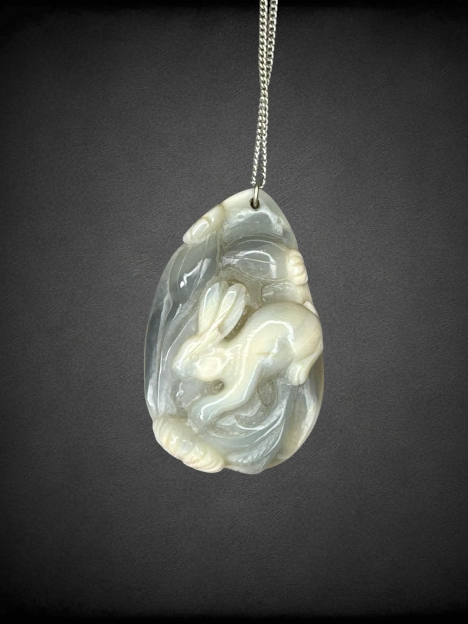 Silver chain necklace with hand-carved bunny stone pendant