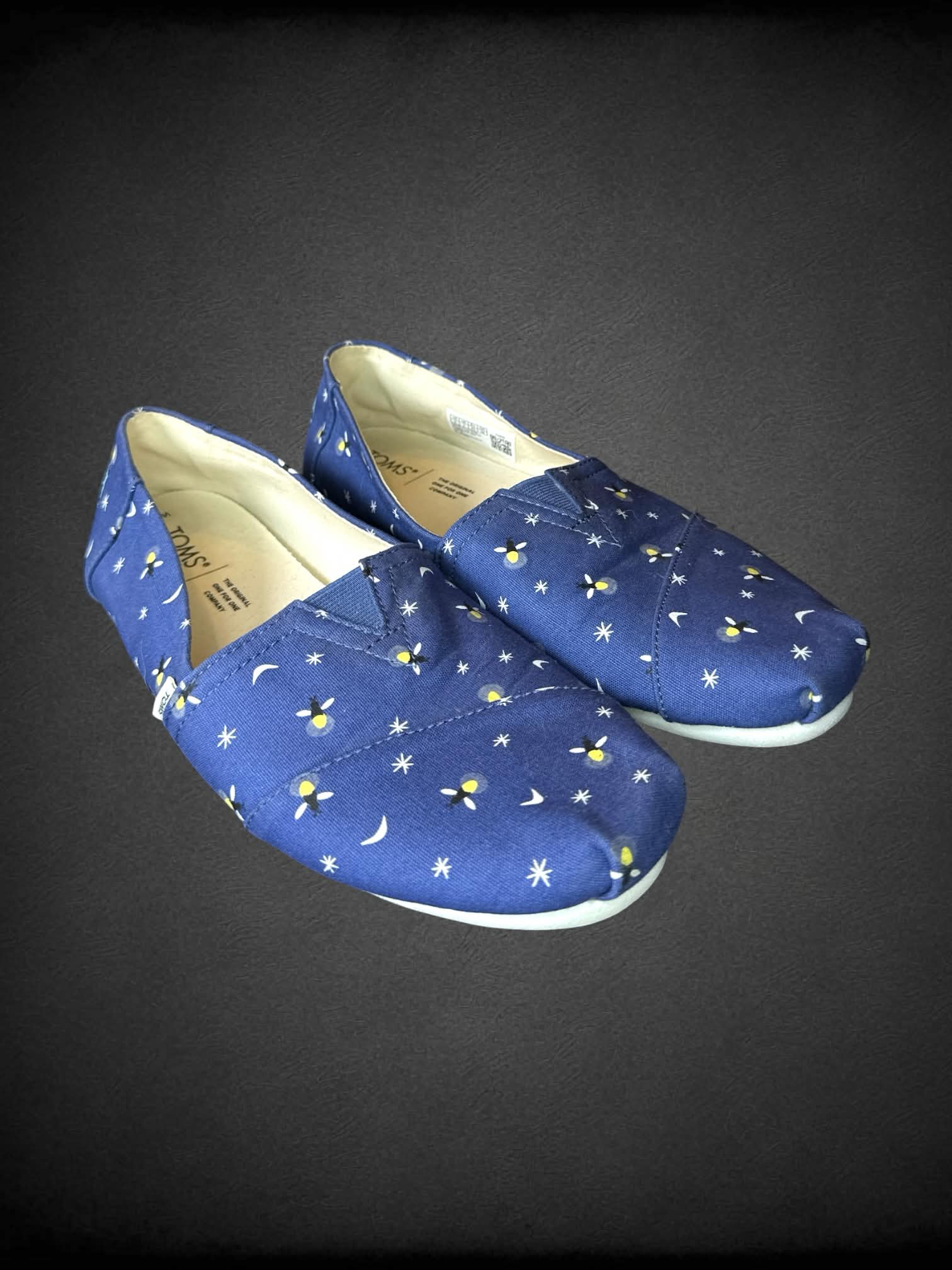 Size 6M Toms blue glow-in-the-dark firefly shoes