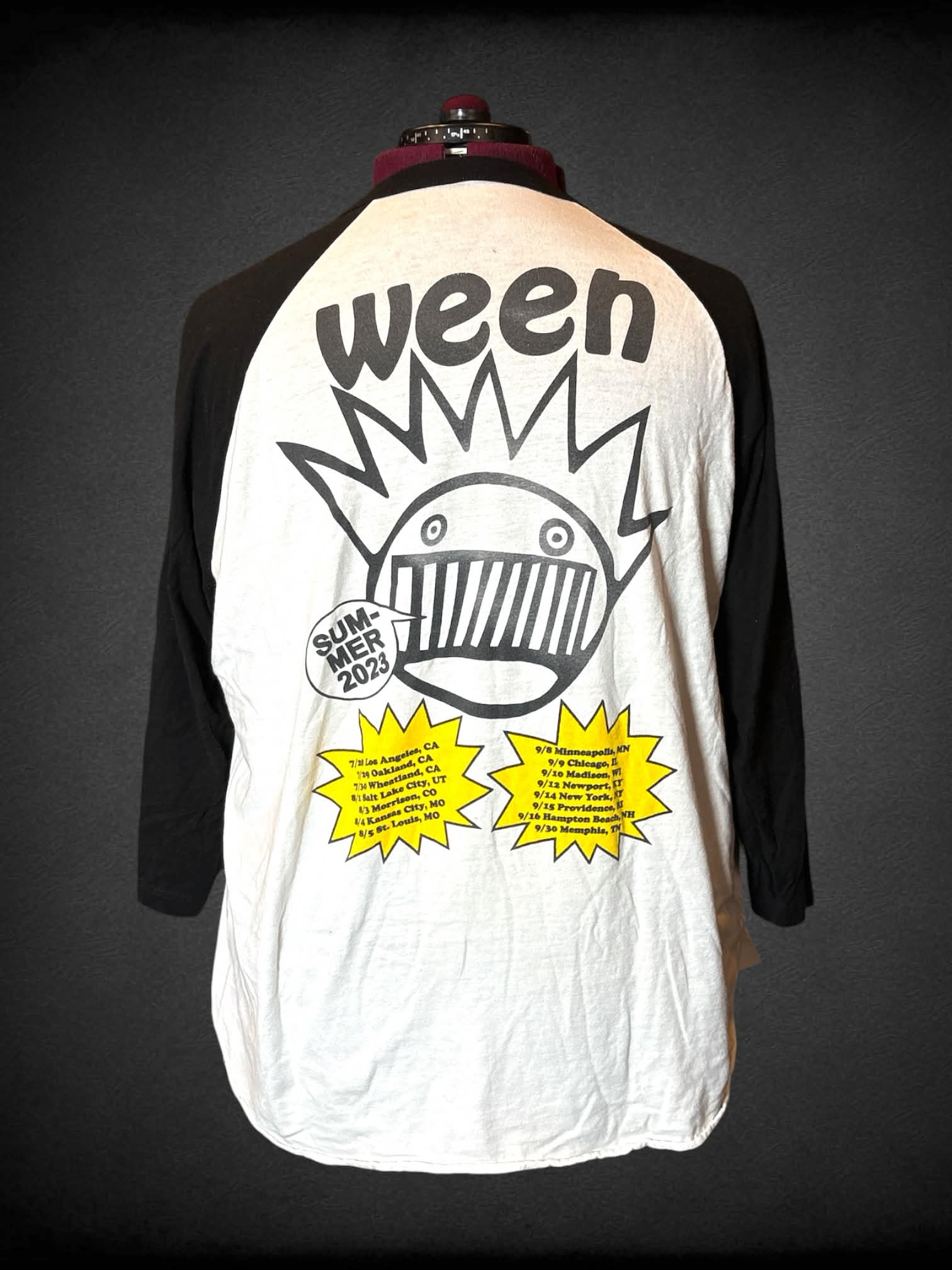3X Ween white raglan t shirt with “Ween” ferrets on rollercoaster graphic on front, and 2023 tour dates on back