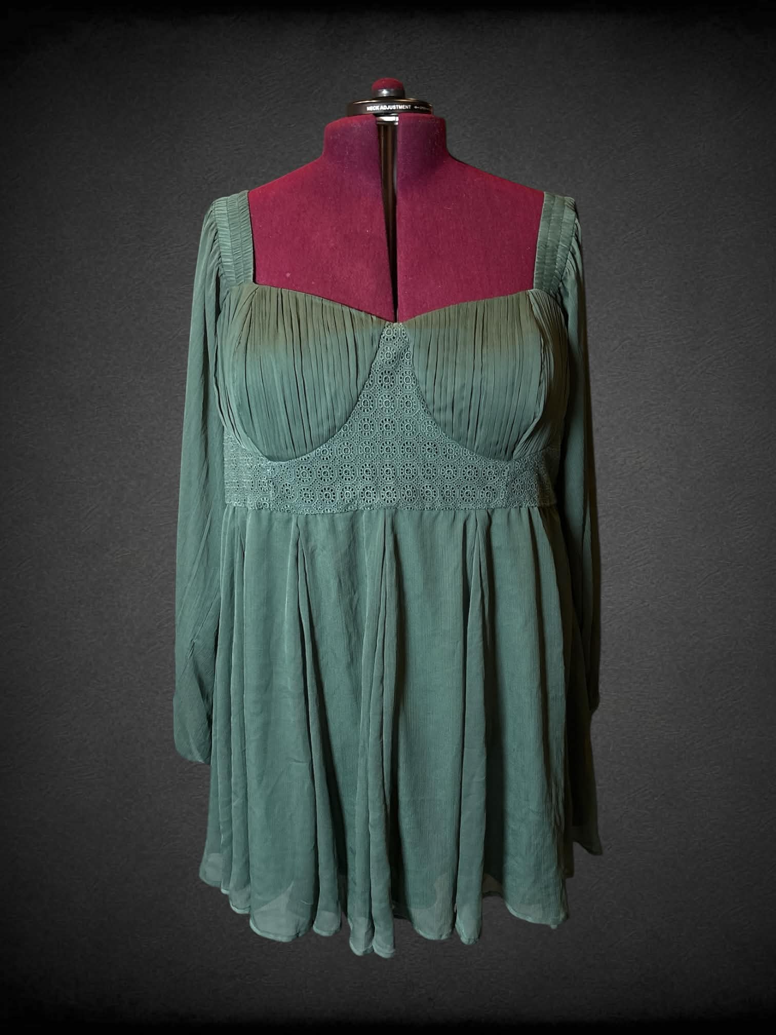 2X ASOS green long-sleeve short dress with padded bra, embroidery design on front, and zipper on side