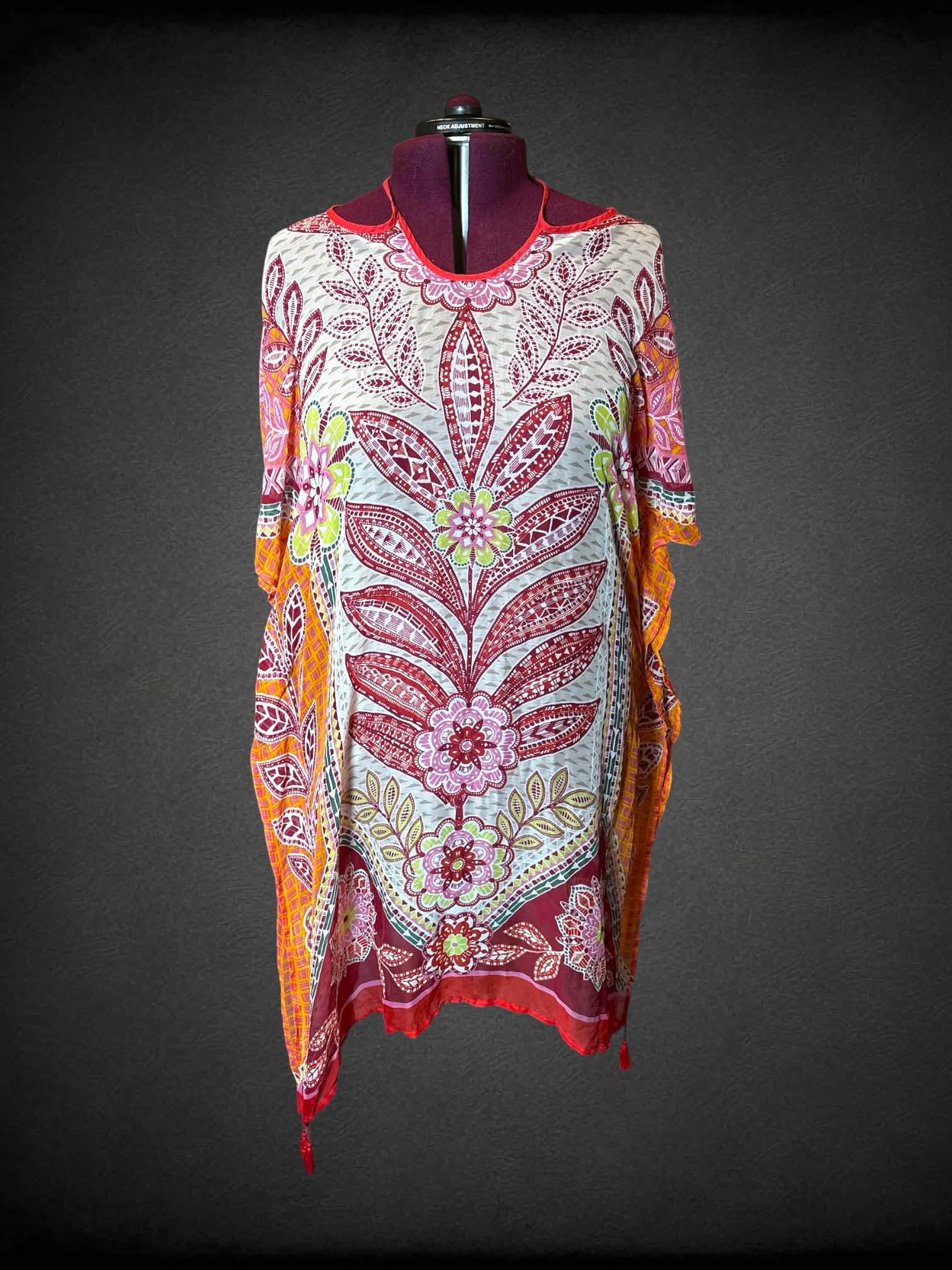 2X white sheer flowy dress with colorful symmetrical floral design, and tassels