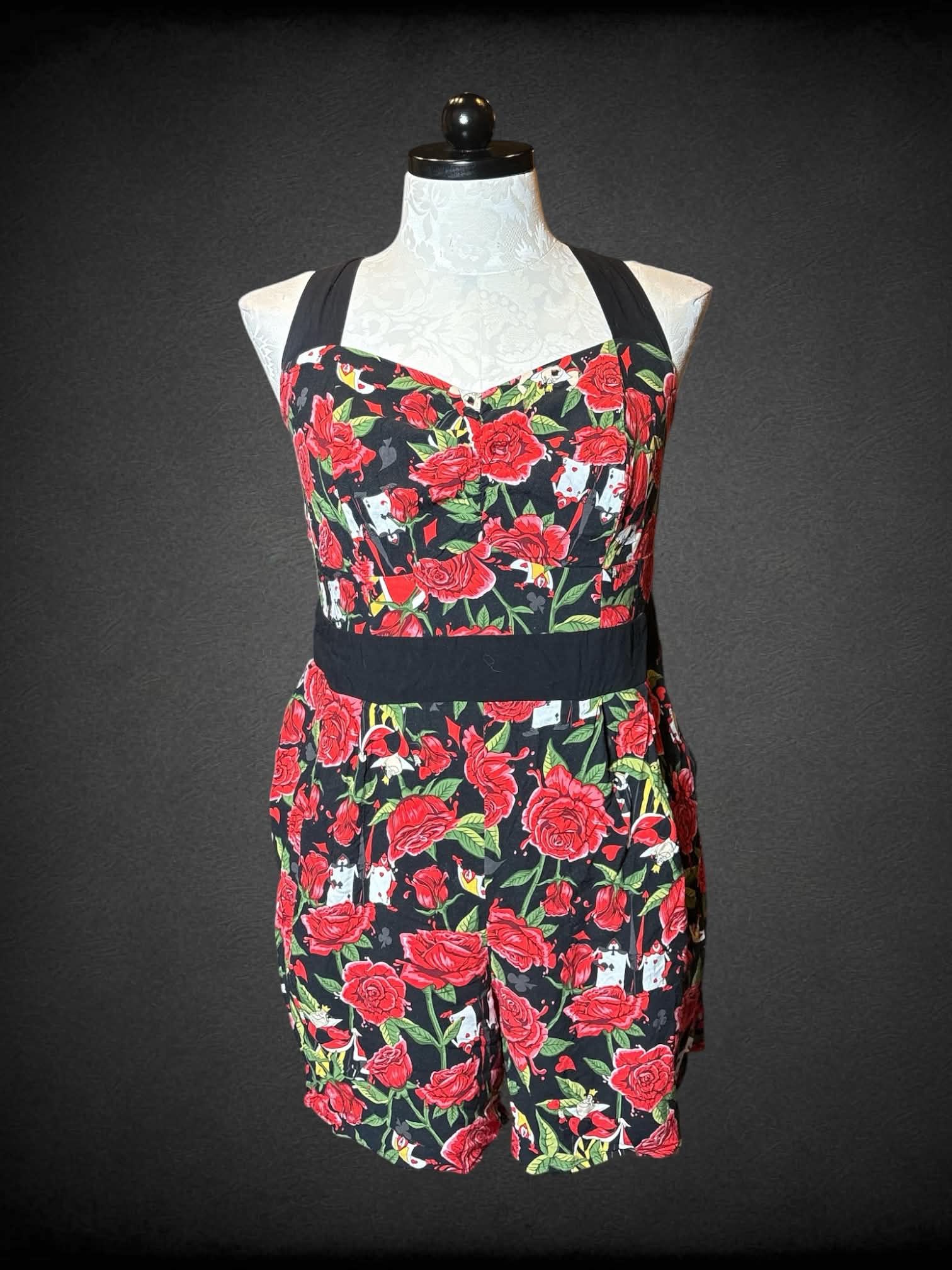 0X Disney Villains black & red jumpsuit with “Alice in Wonderland” red queen and rose pattern, pockets, and cross tie straps on back