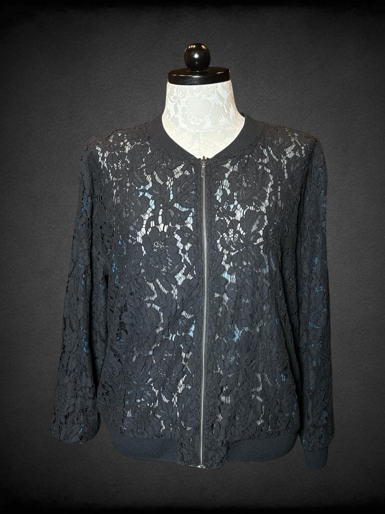 0X reversible black zip-up jacket with black embroidery design, and mesh blue floral design