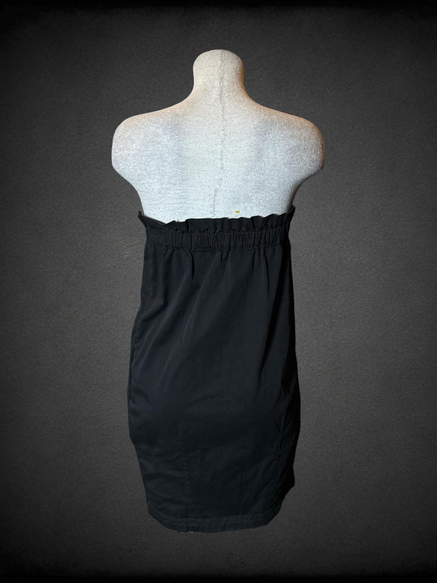 L Everlane black strapless short dress with pockets, and ruffle neckline