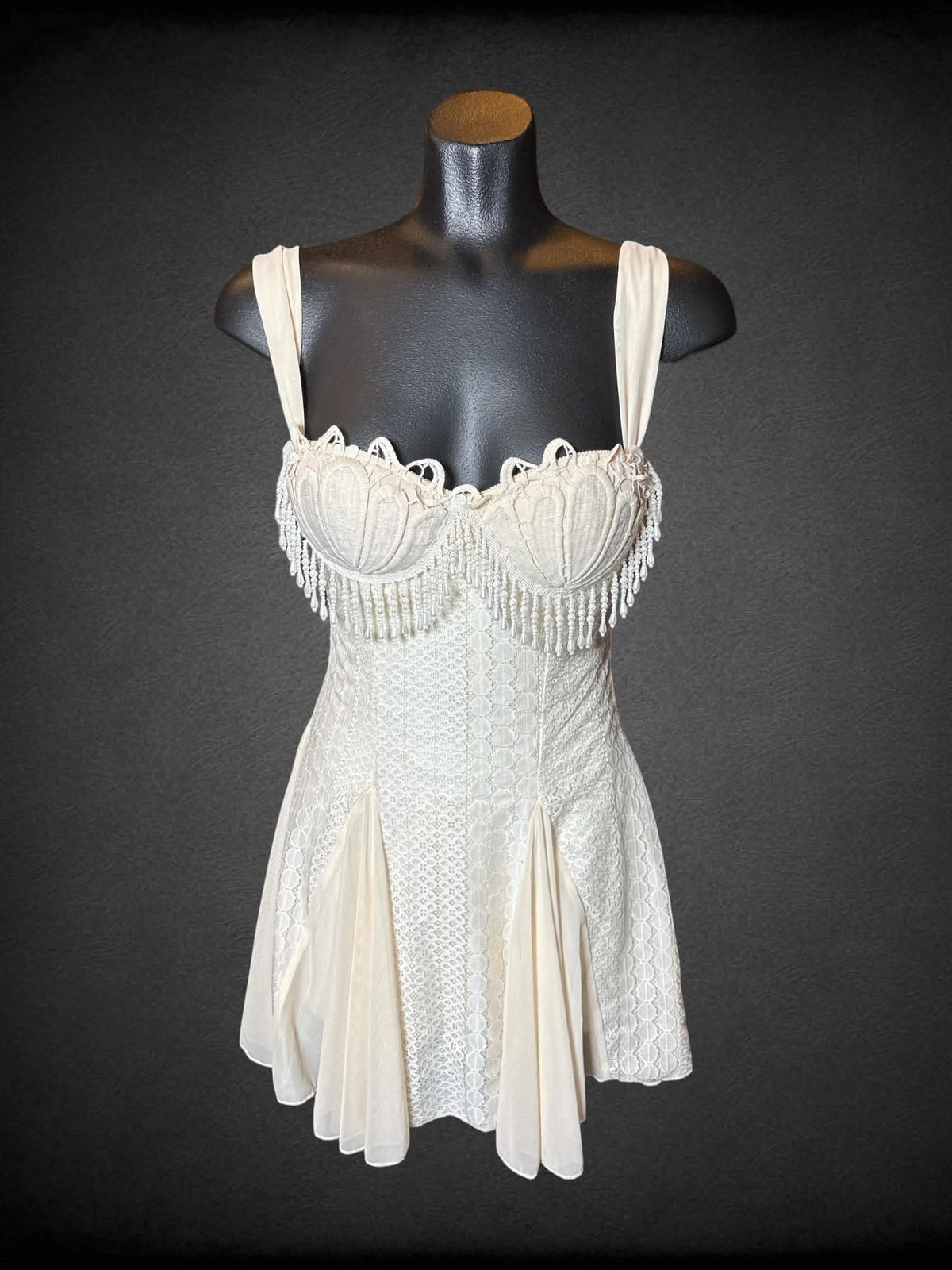 S offwhite short dress with beaded detailing on bra, lace pleated design, zipper on back and adjustable straps