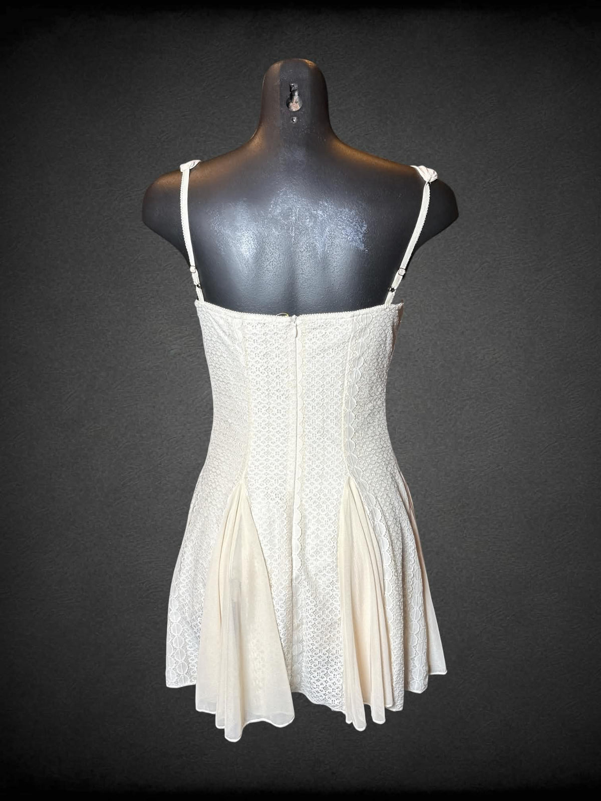 S offwhite short dress with beaded detailing on bra, lace pleated design, zipper on back and adjustable straps