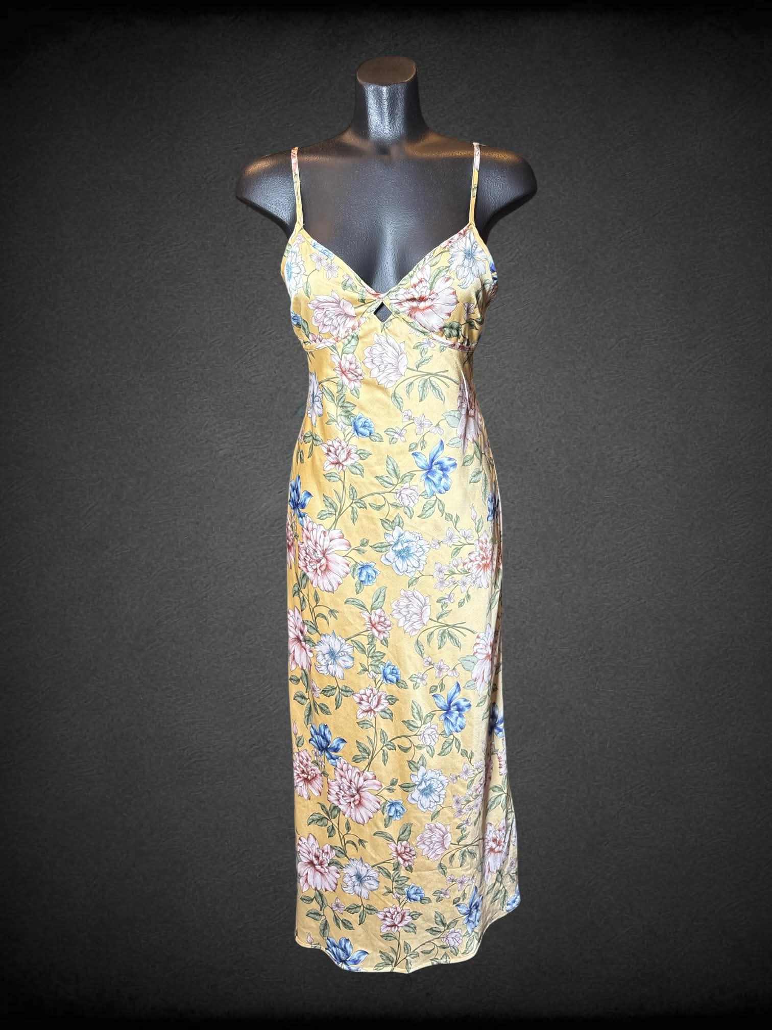 M Thirty Thirty yellow dress with floral pattern, cutout design on front and back, and adjustable straps