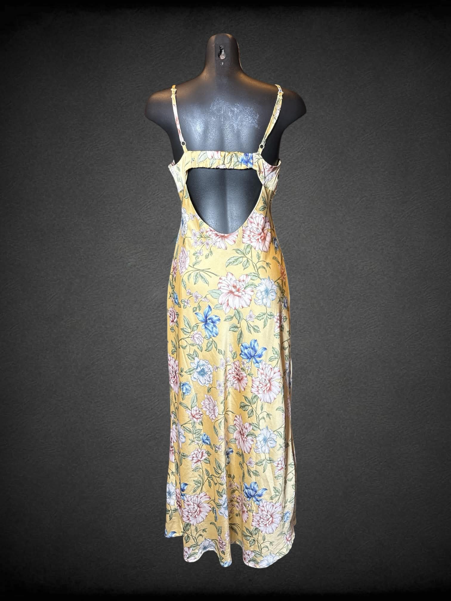 M Thirty Thirty yellow dress with floral pattern, cutout design on front and back, and adjustable straps