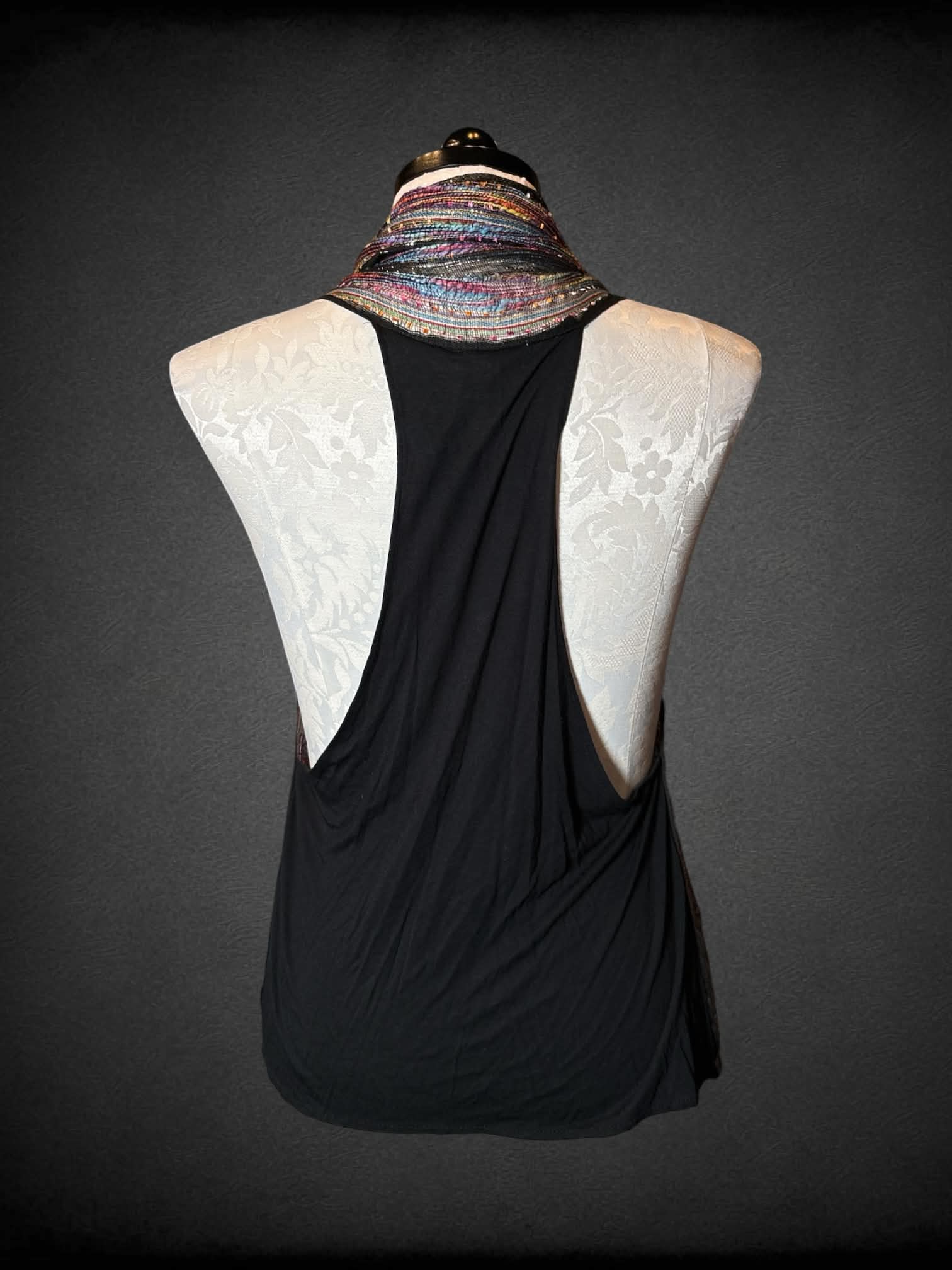 1X colorful woven outer-layer with metallic pattern, and tassels on hemline
