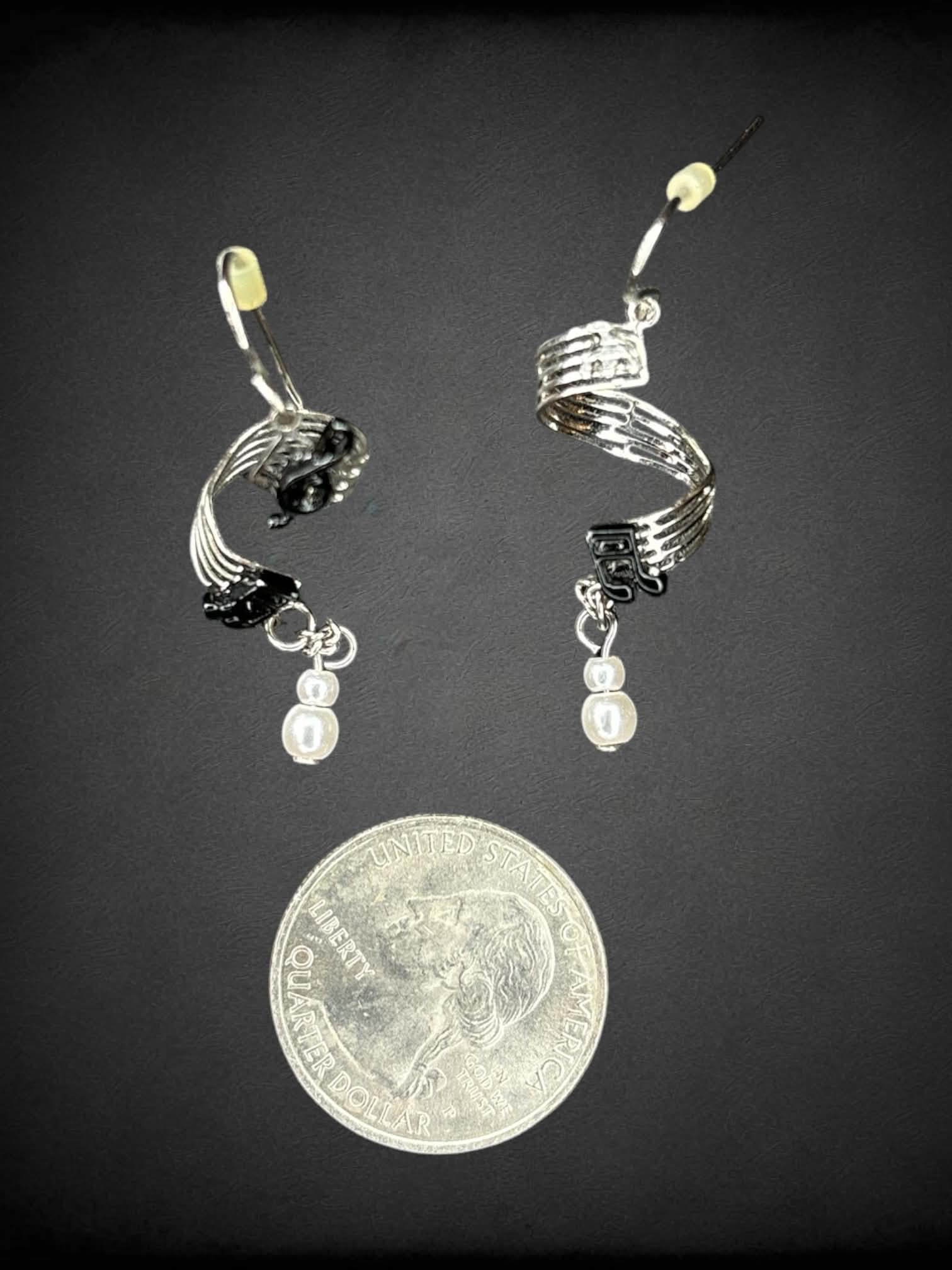 Silver musical notes spiral earrings