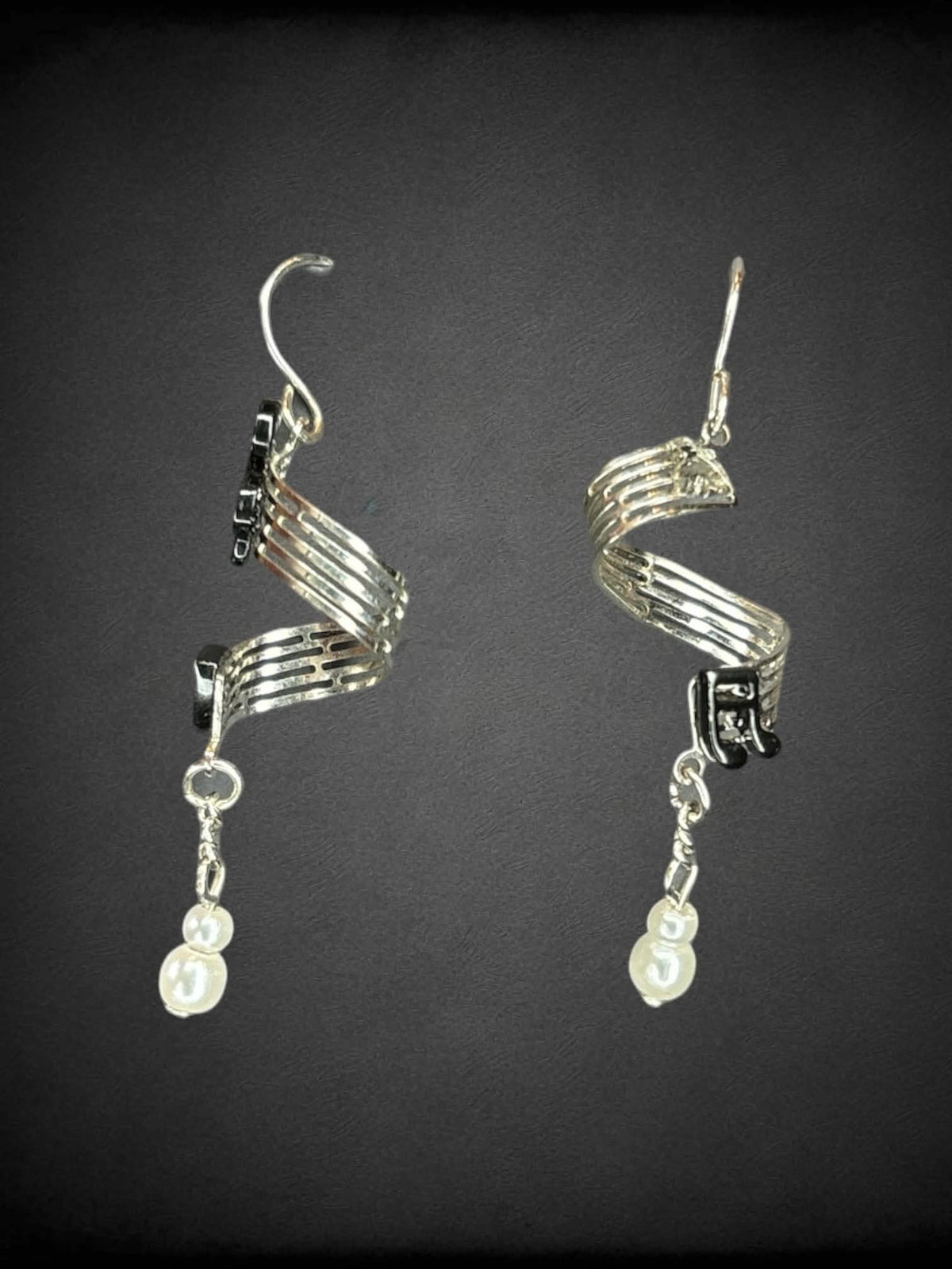 Silver musical notes spiral earrings