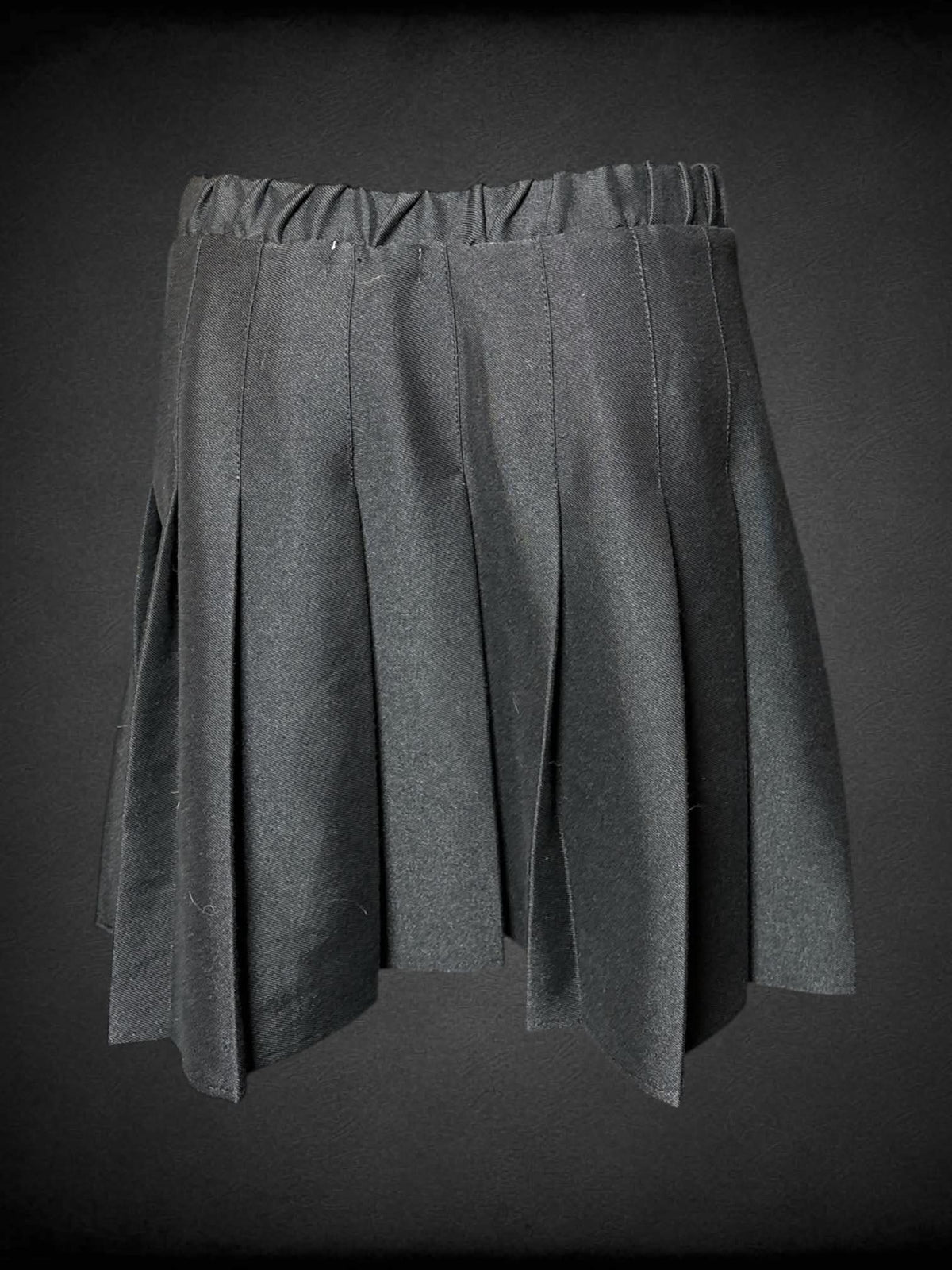 M Rewind black pleated skirt with zipper and button on side