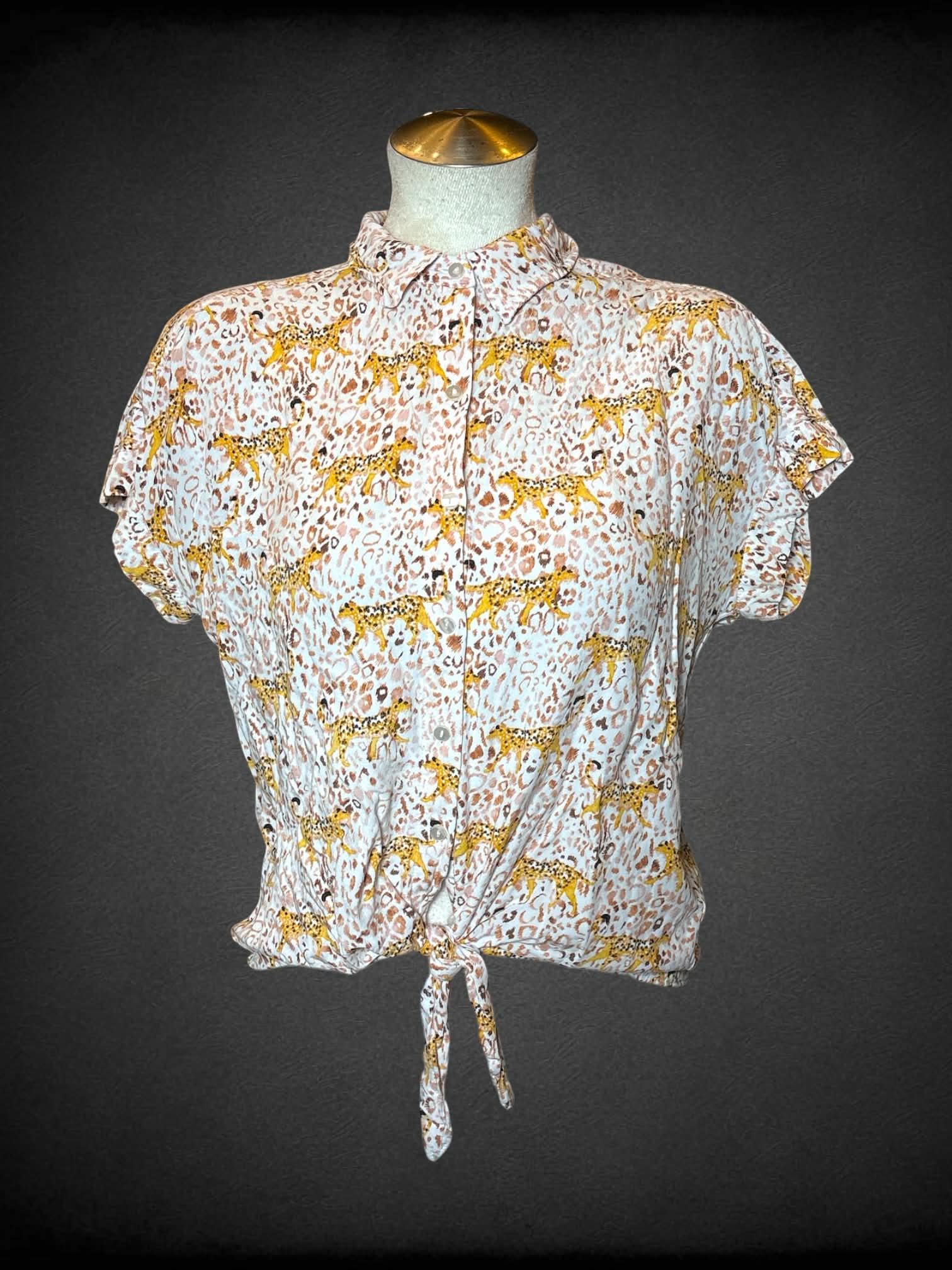 L Jane Delancey white button-up shirt with cheetah pattern, and cropped tie on front