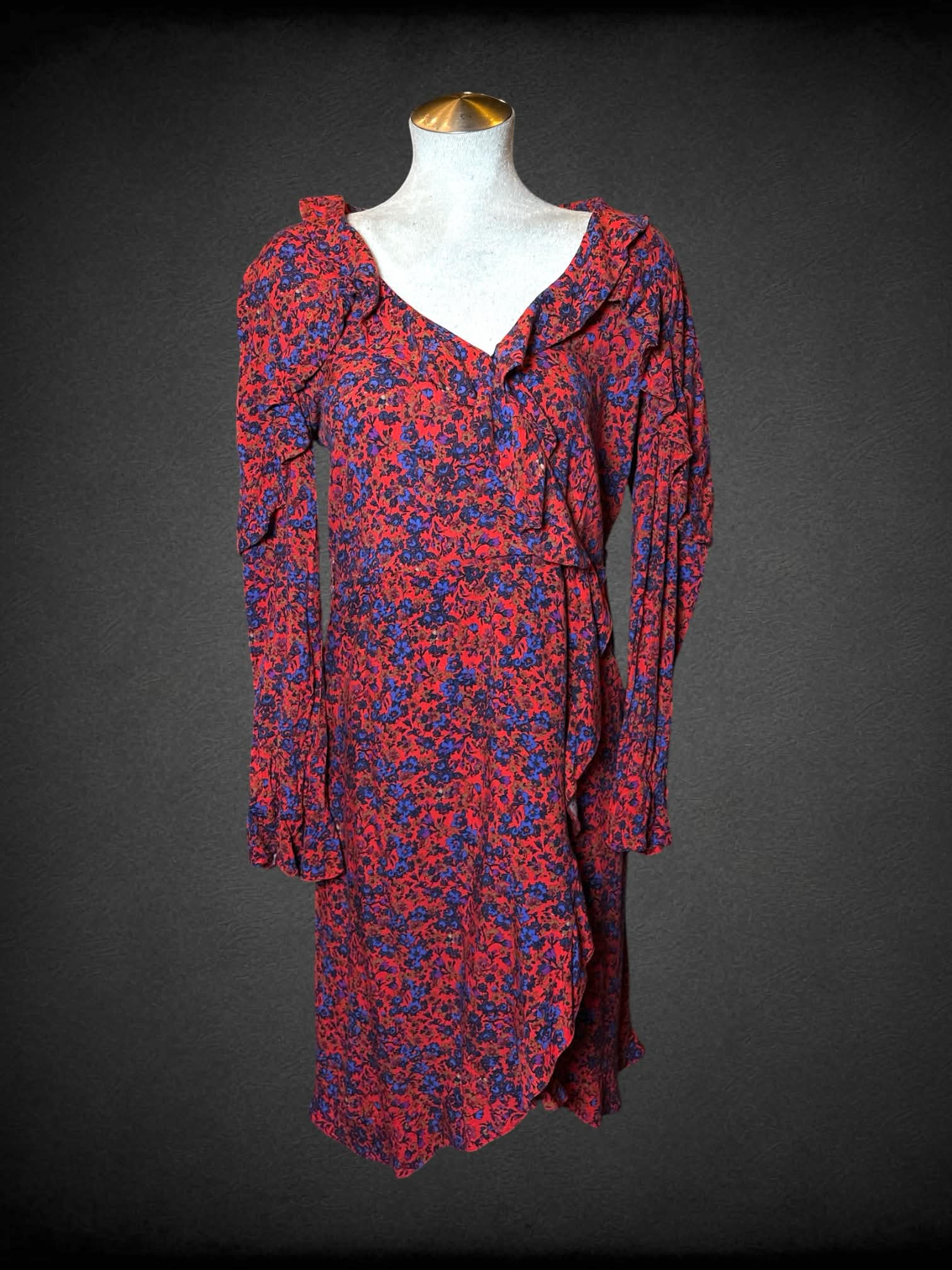 L H&M red long-sleeve dress with blue floral pattern, and wrap-around clasp on front