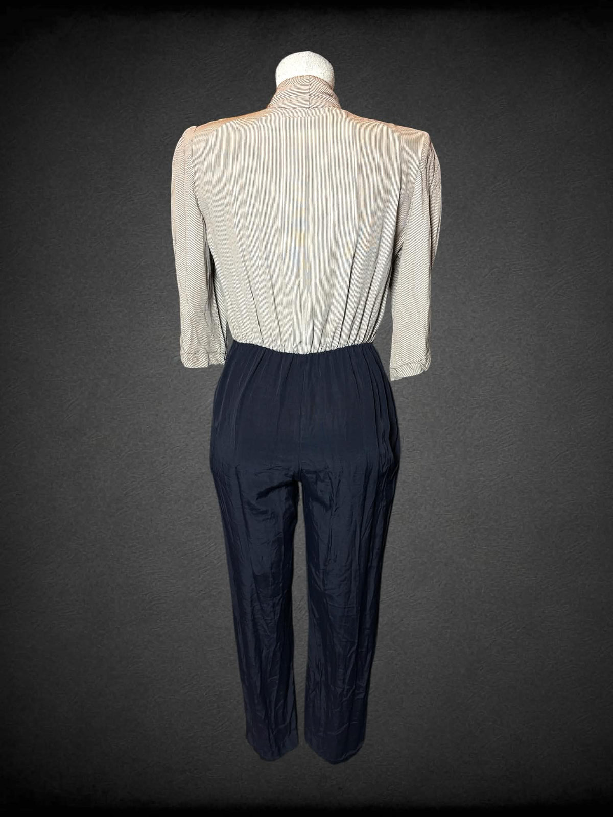 Renditions vintage black & brown jumpsuit with striped pattern, padded shoulders, and buttons on front