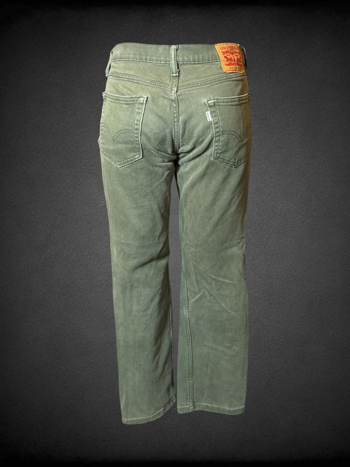 L Levi’s green mid-rise boot cut jeans