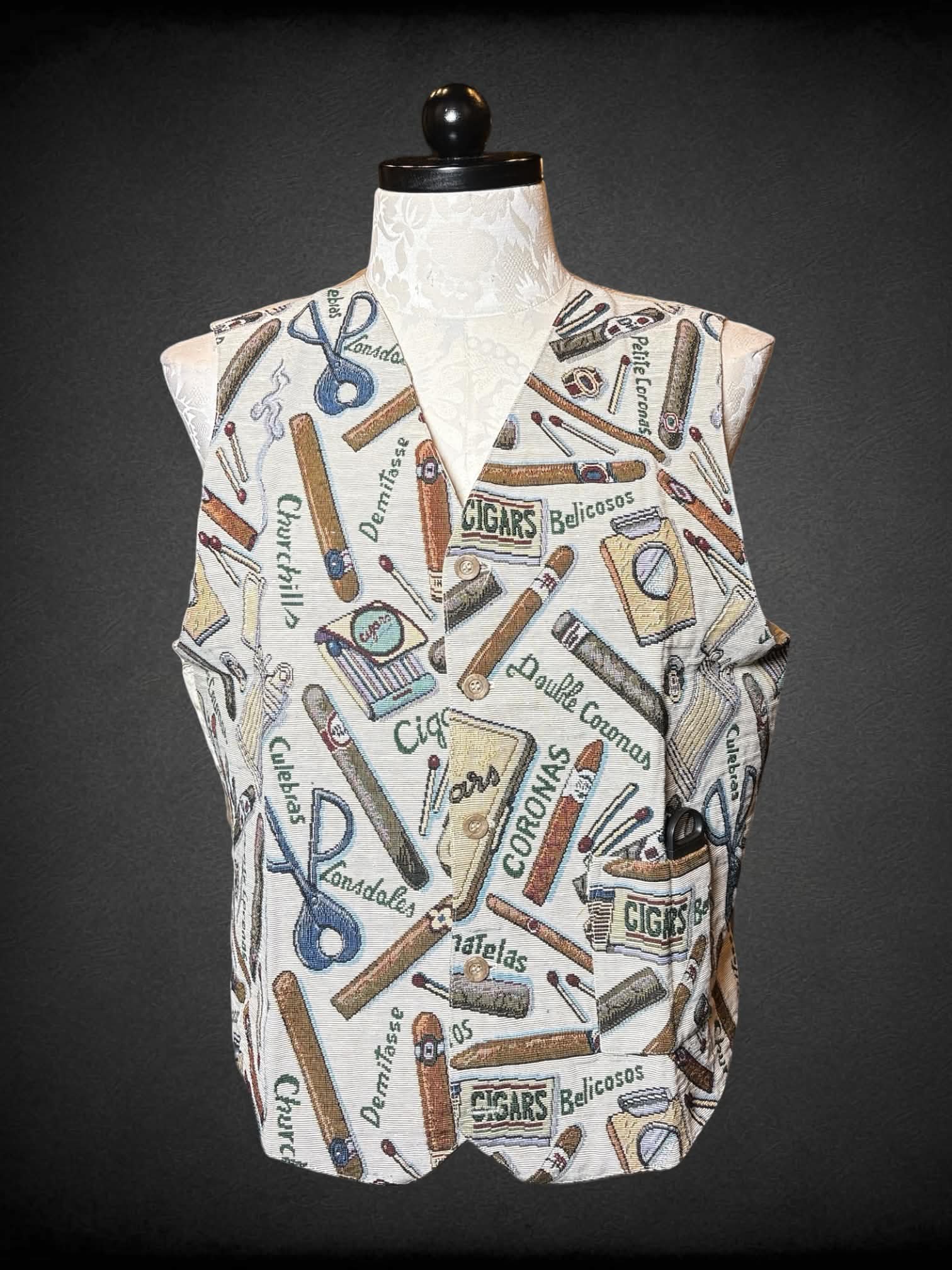 0X Cigargoyles vintage tan canvas button-up vest with cigar and match pattern, and cigar cutter in pocket