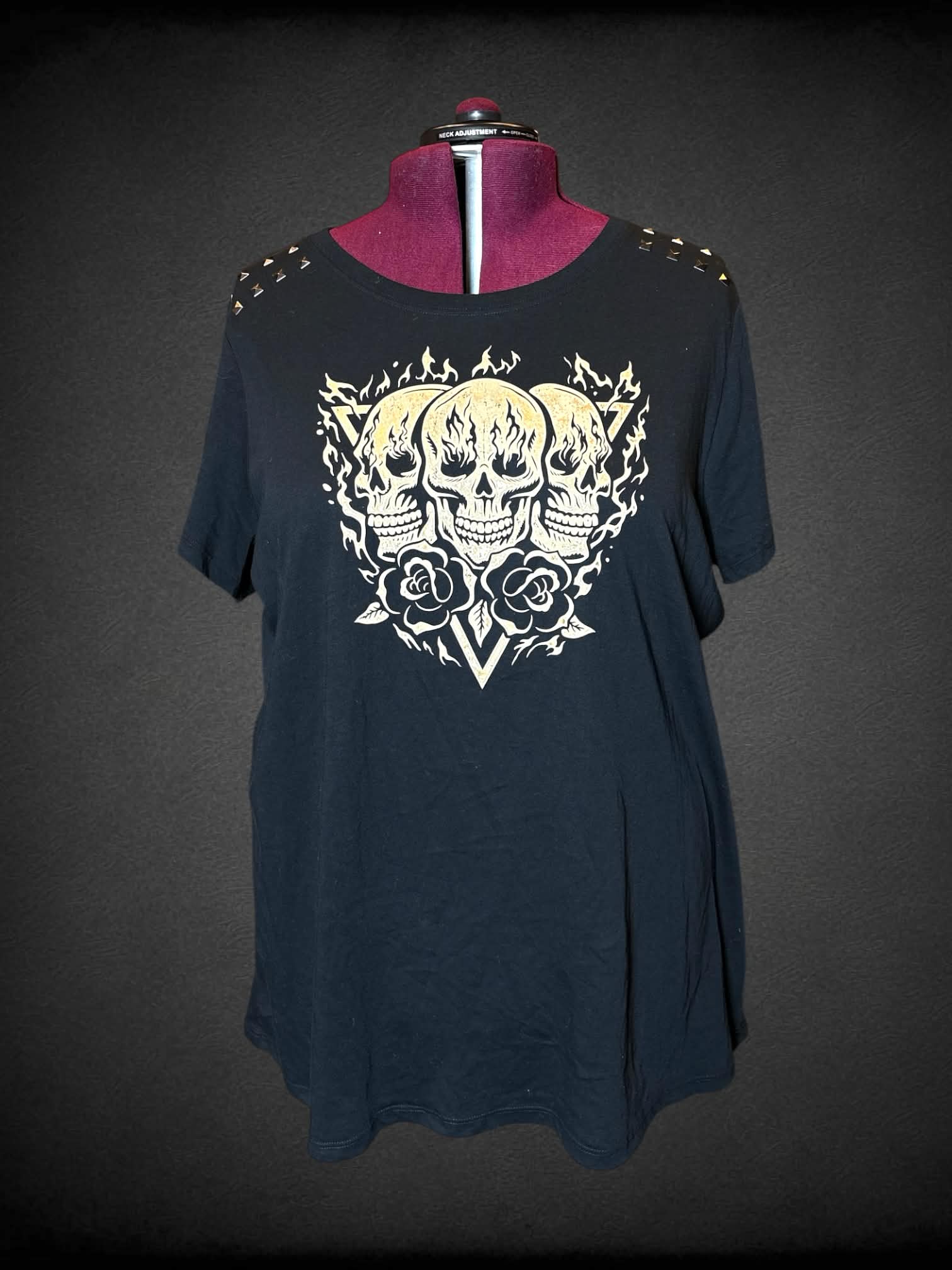 3X Torrid black shirt with skull & rose graphic on front, and studded detailing on shoulders