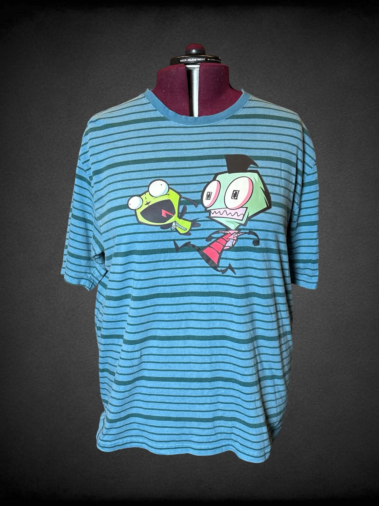 3X DumbGood blue t shirt with green striped pattern, and “Invader Zim” graphic on front
