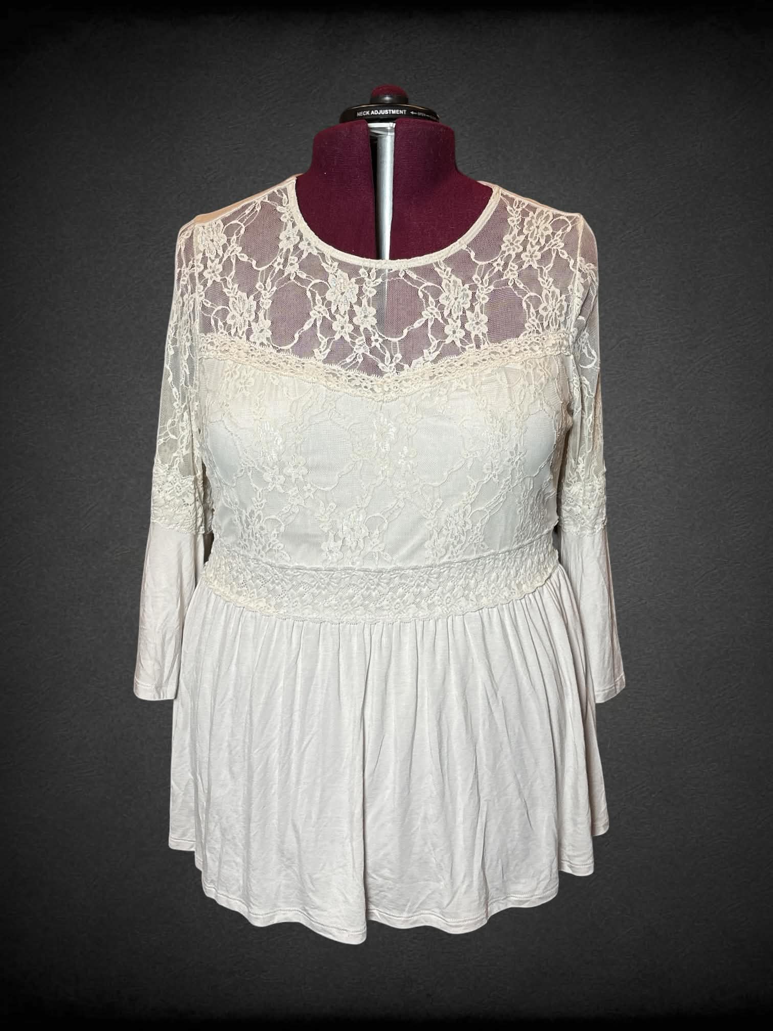 2X Torrid beige long-sleeve blouse with lace design, and bell sleeves