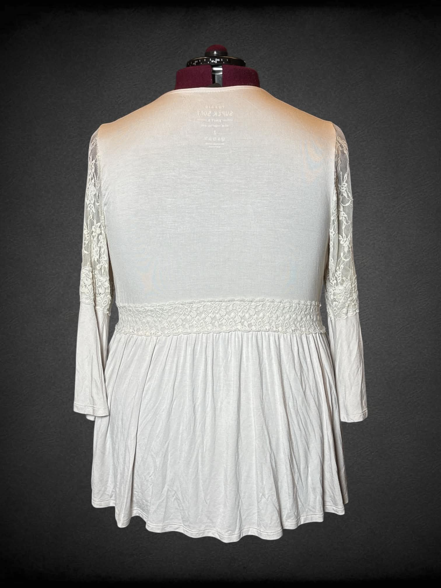 2X Torrid beige long-sleeve blouse with lace design, and bell sleeves