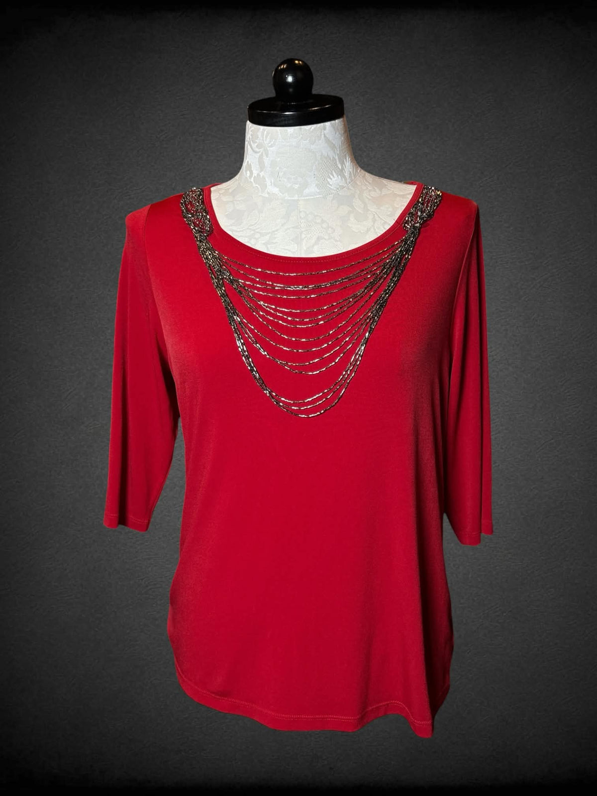 0X Essentials red three-quarter sleeve shirt with metallic beaded chain design on fron