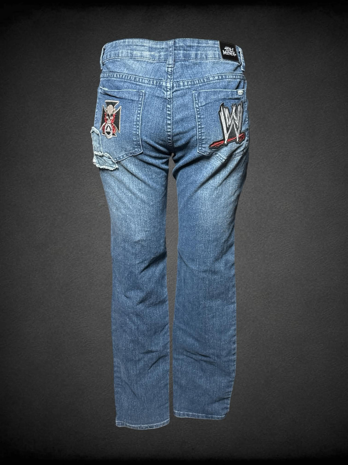 L Idle Minds blue jeans with distressed patch design, and rock n roll patches on front and back