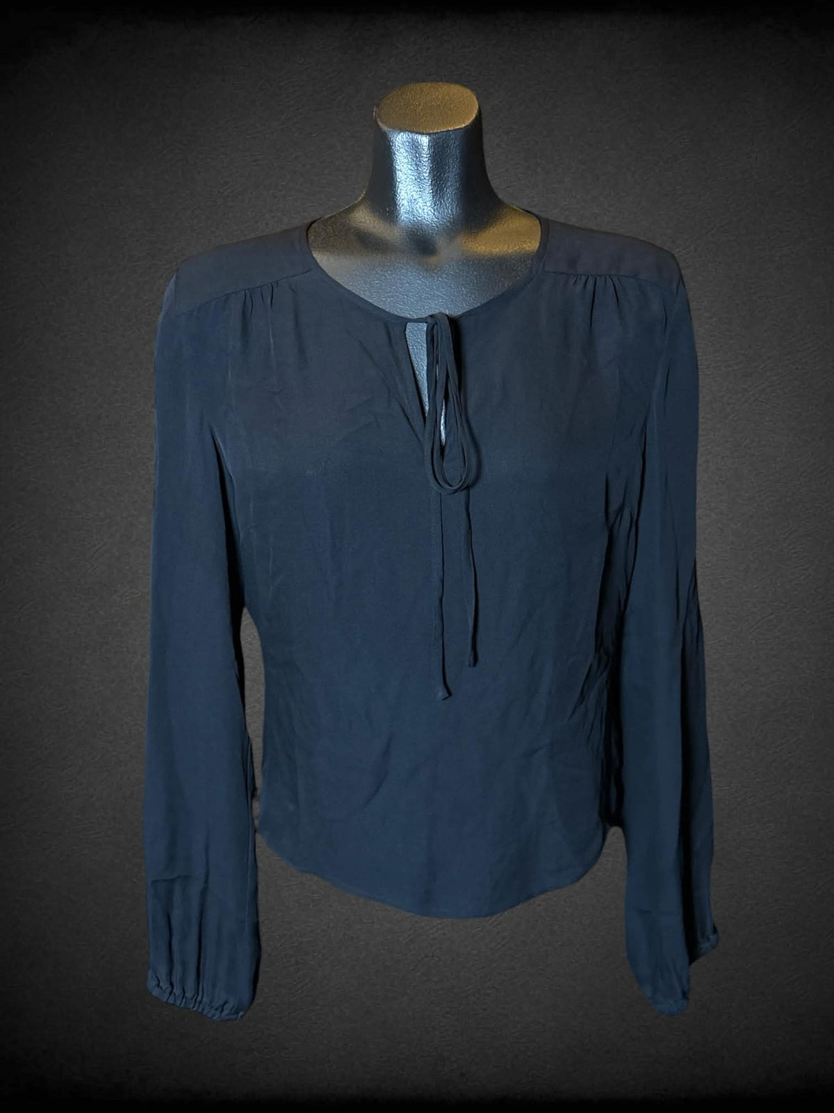 L Newport News black sheer silk long-sleeve blouse with tie up cutout design on fron