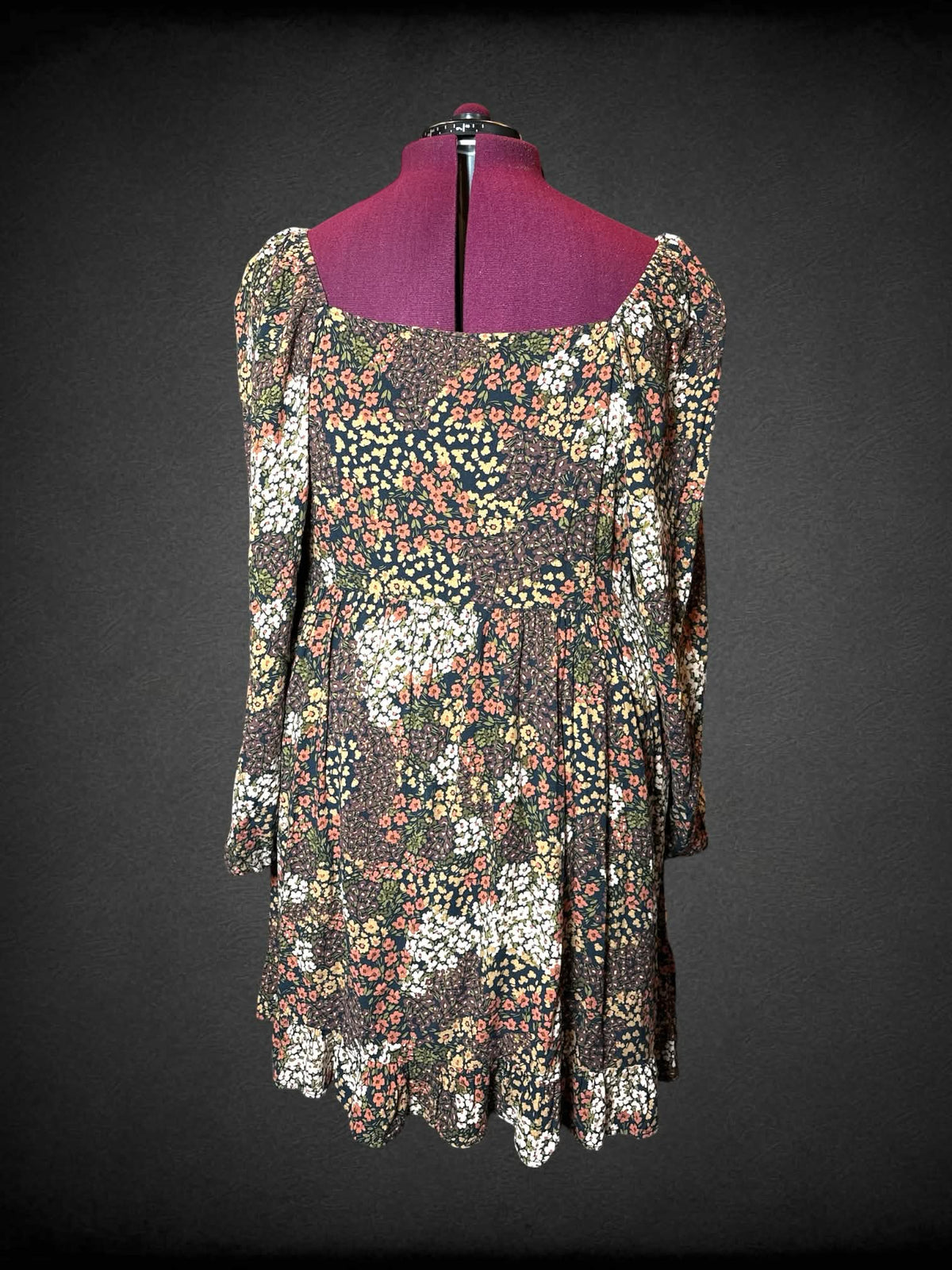 2X City Chic brown long-sleeve short dress with floral pattern, and shirred top