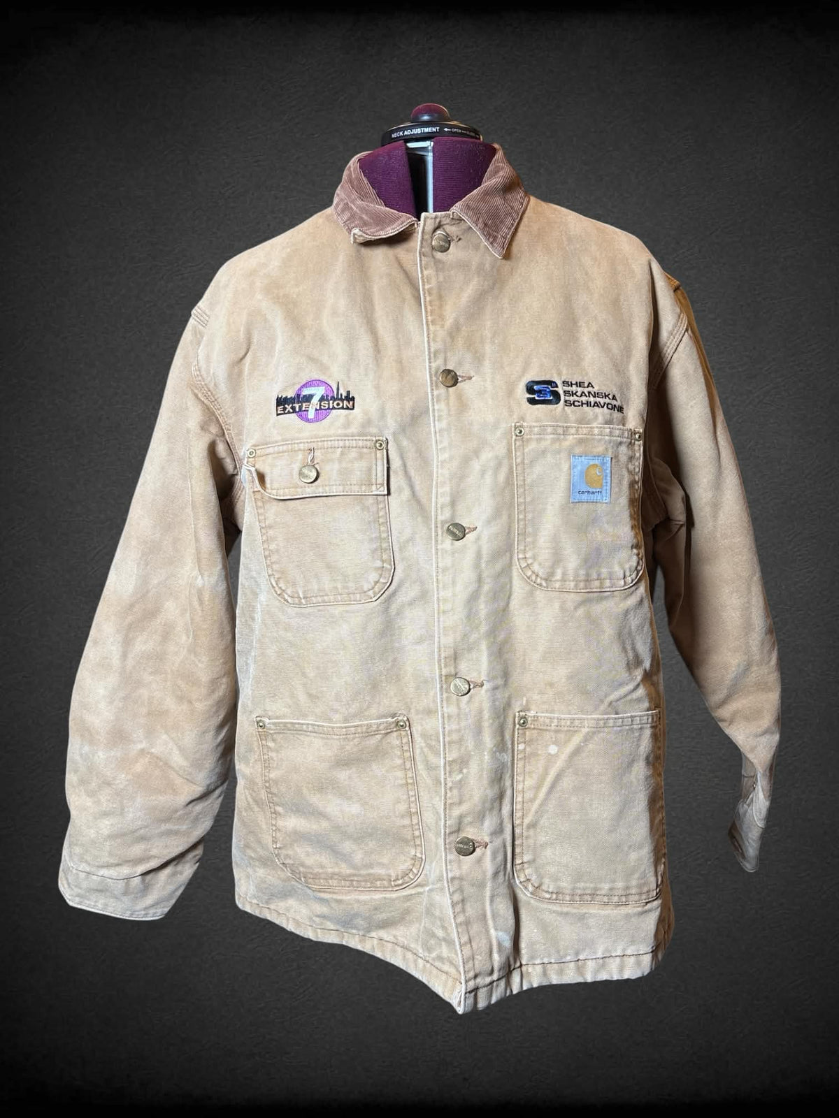 3X Carhartt tan heavyweight button-up jacket with corduroy collar, pockets, and embroidery on front
