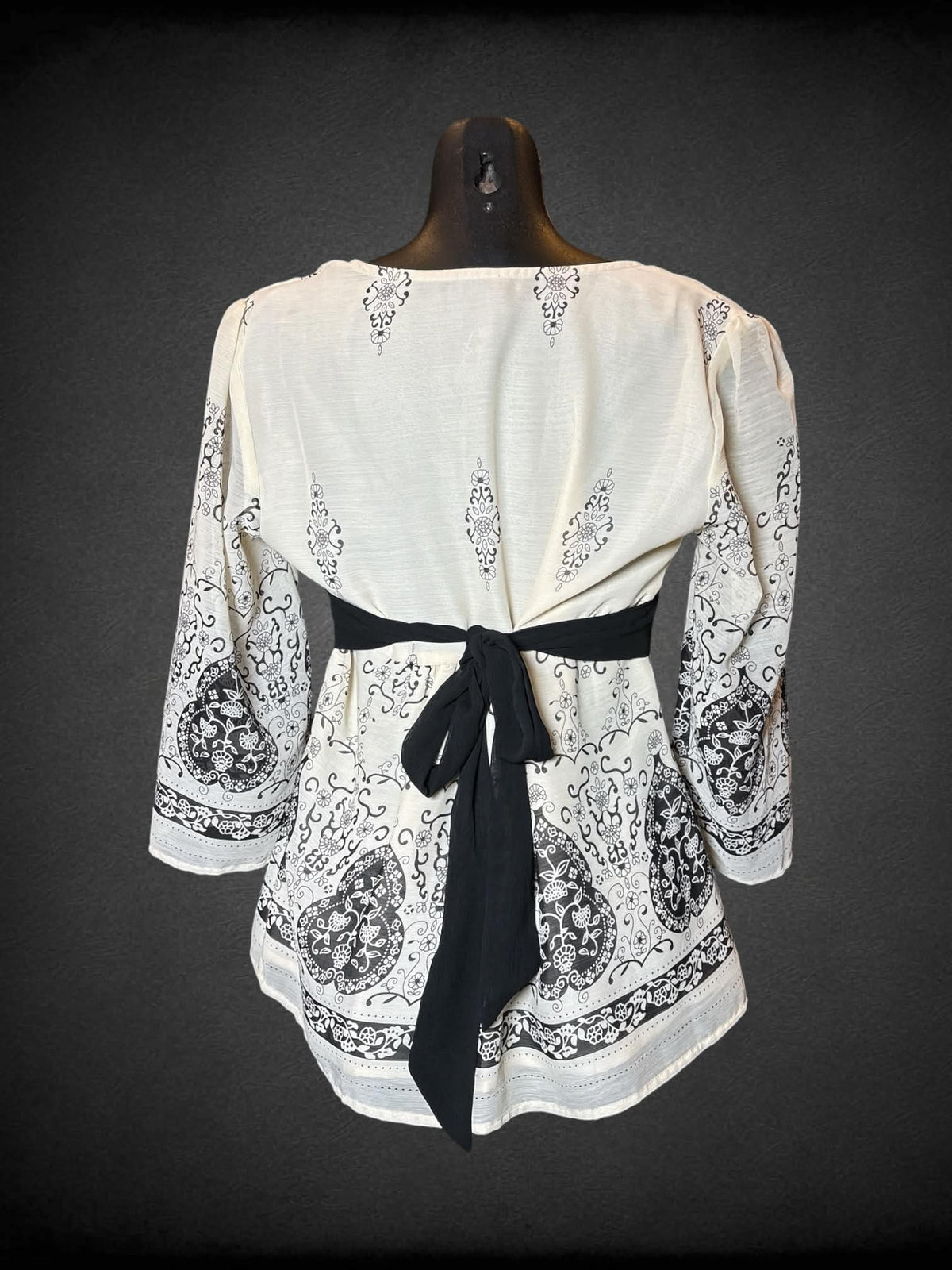 M Essentials By Milano vintage Y2K white blouse with black floral art nouveau design, and black tie around waist