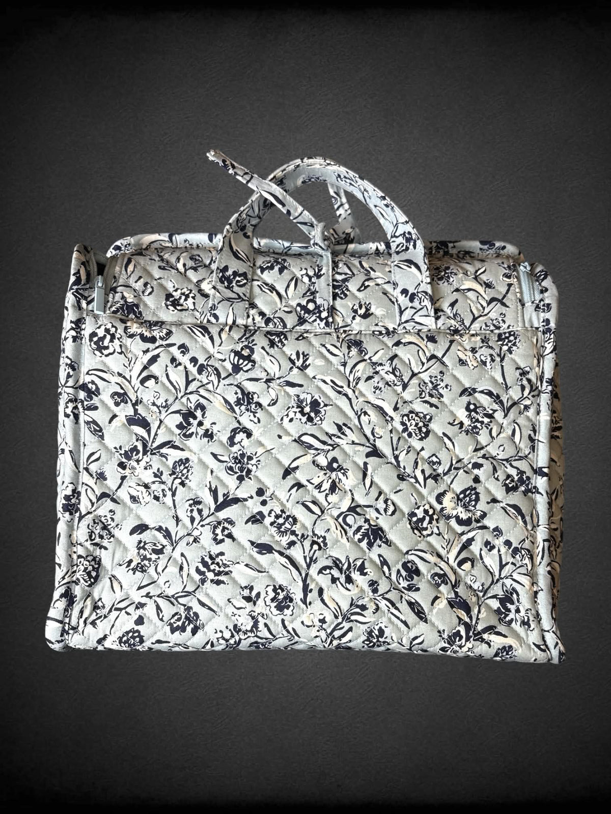 Vera Bradley NWT light blue travel bag with floral design, and zipper and clear pockets