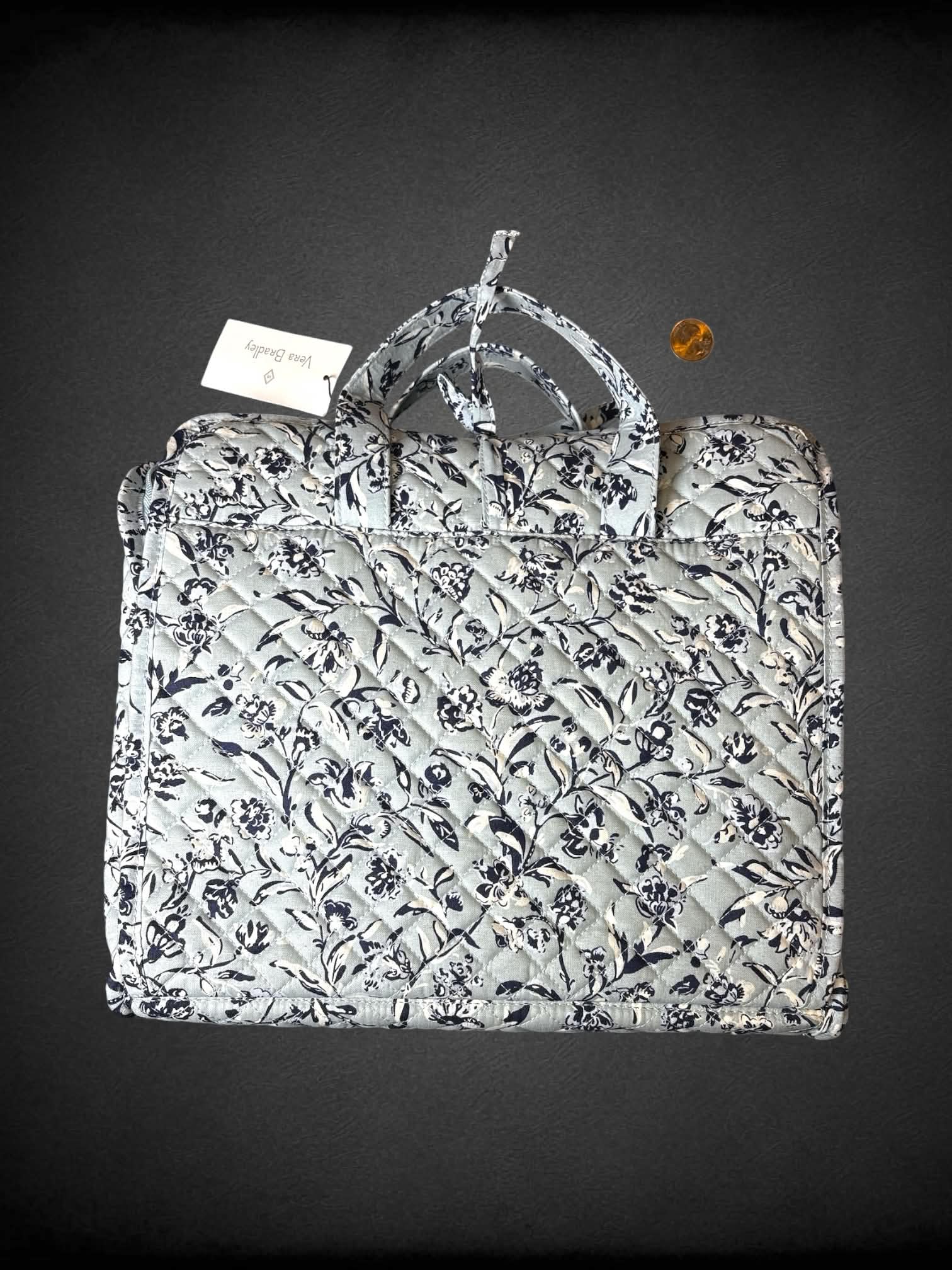 Vera Bradley NWT light blue travel bag with floral design, and zipper and clear pockets