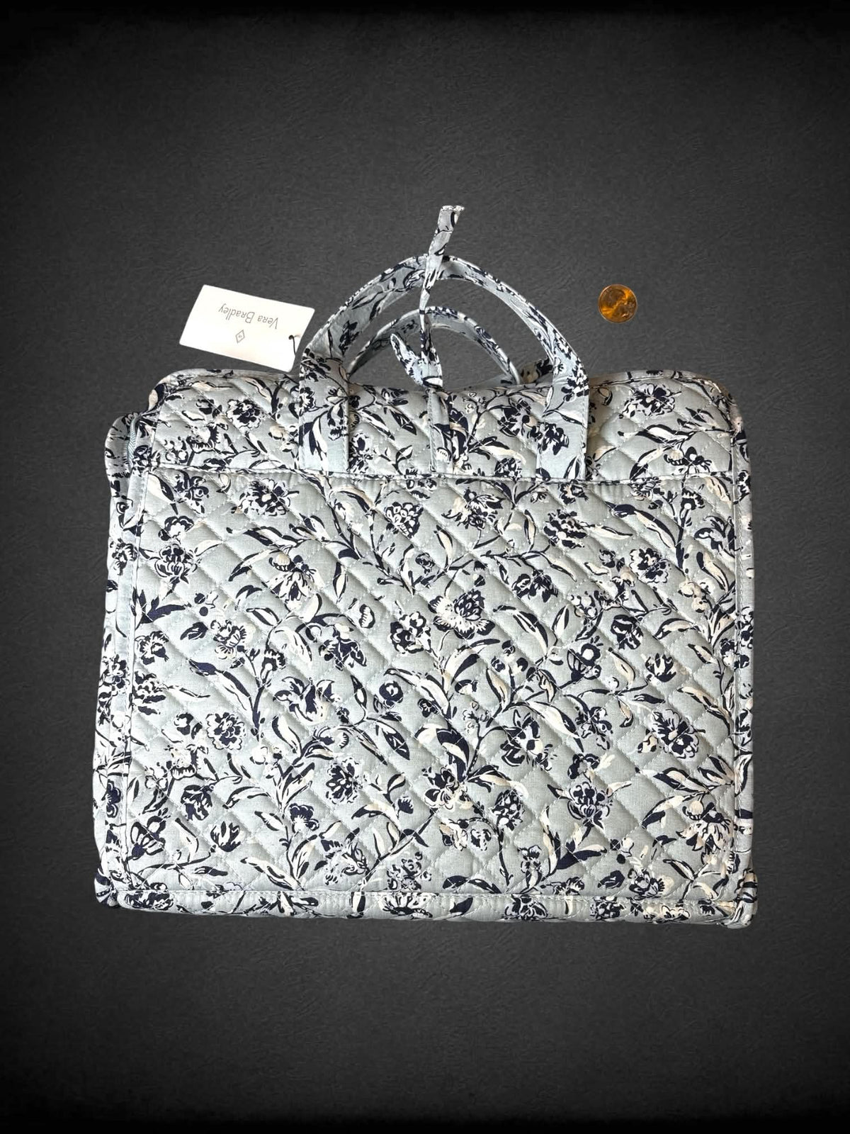 Vera Bradley NWT light blue travel bag with floral design, and zipper and clear pockets