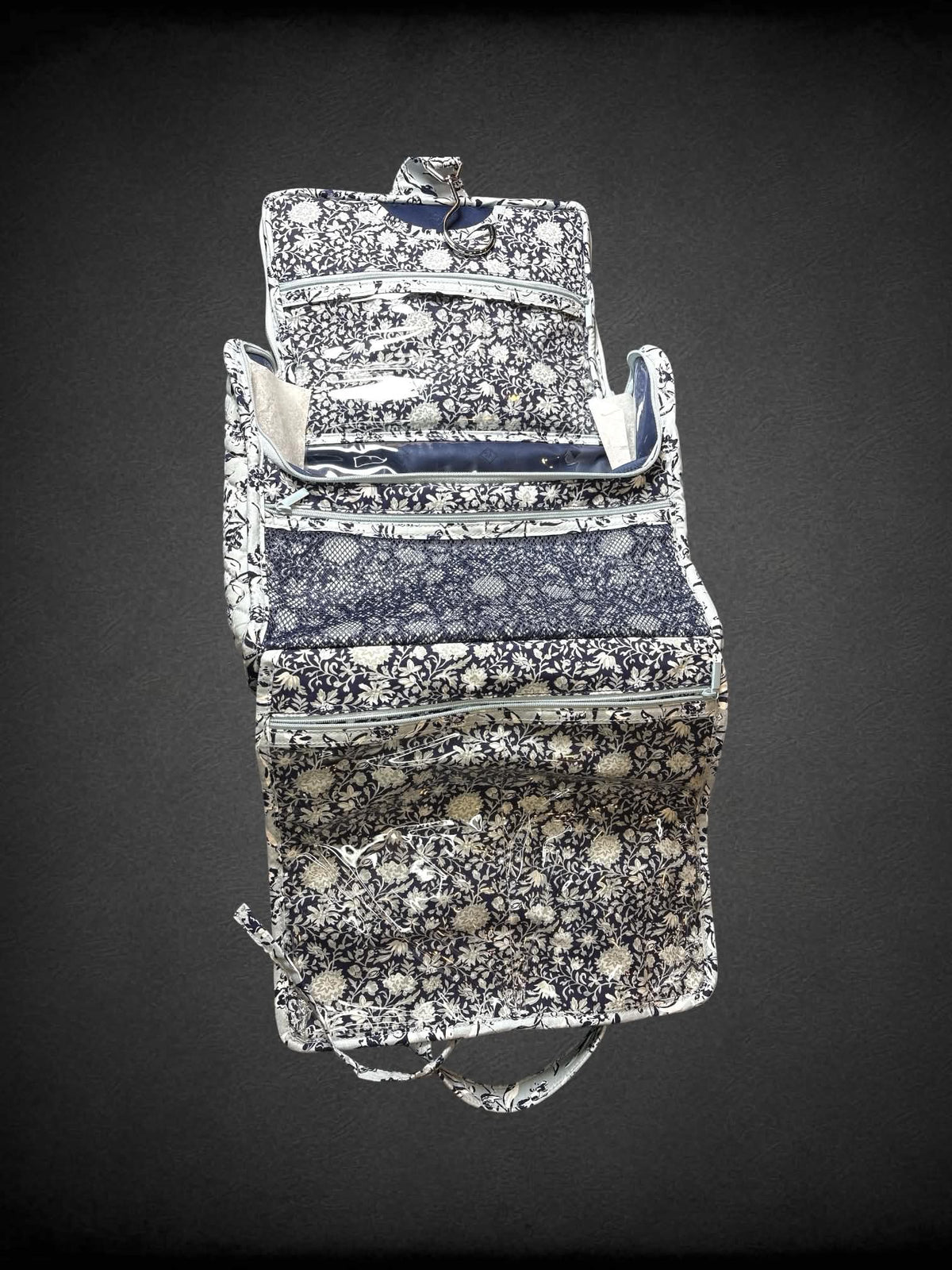 Vera Bradley NWT light blue travel bag with floral design, and zipper and clear pockets