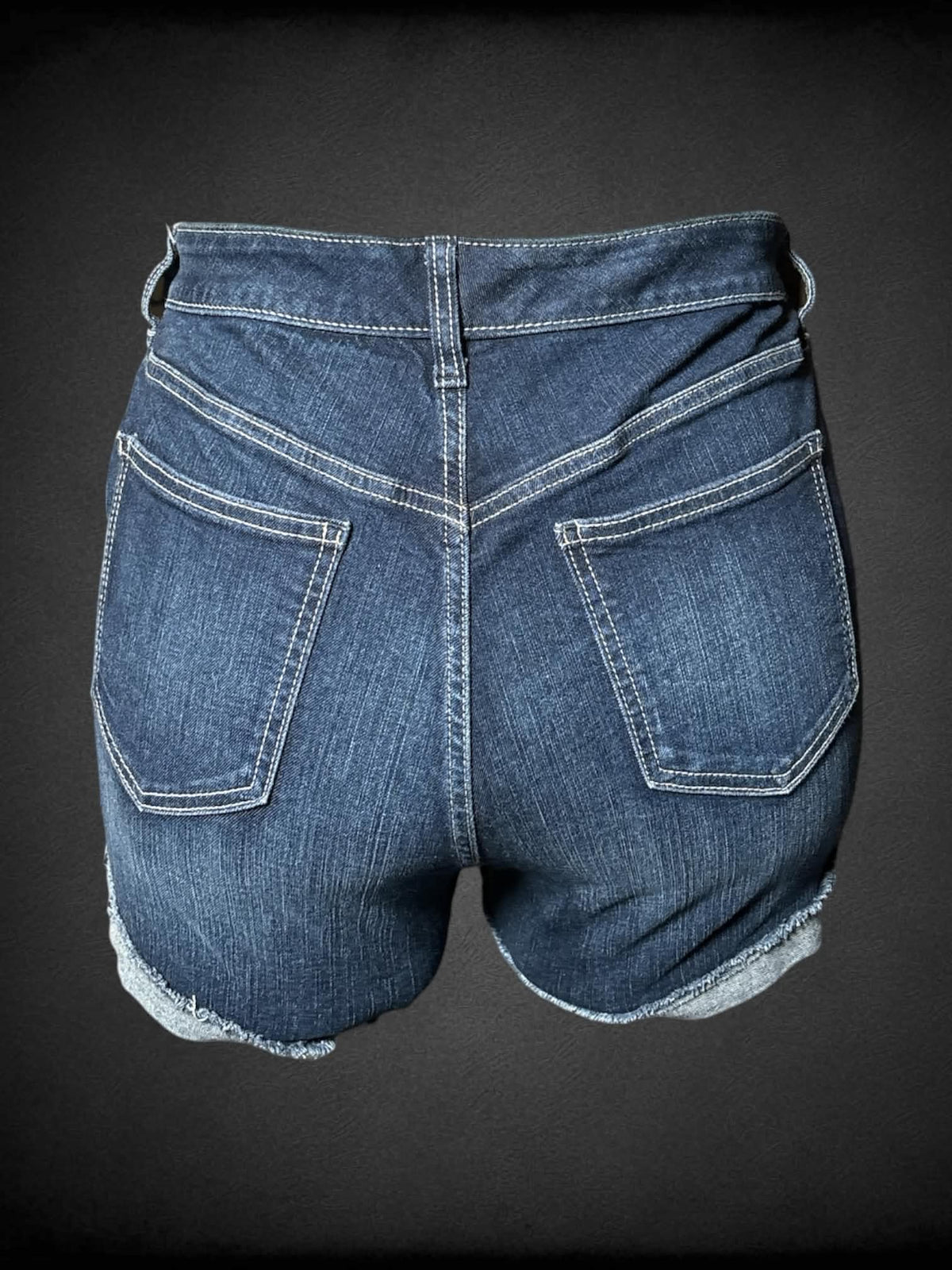 XL Torrid dark blue denim shorts with distressed cuffs