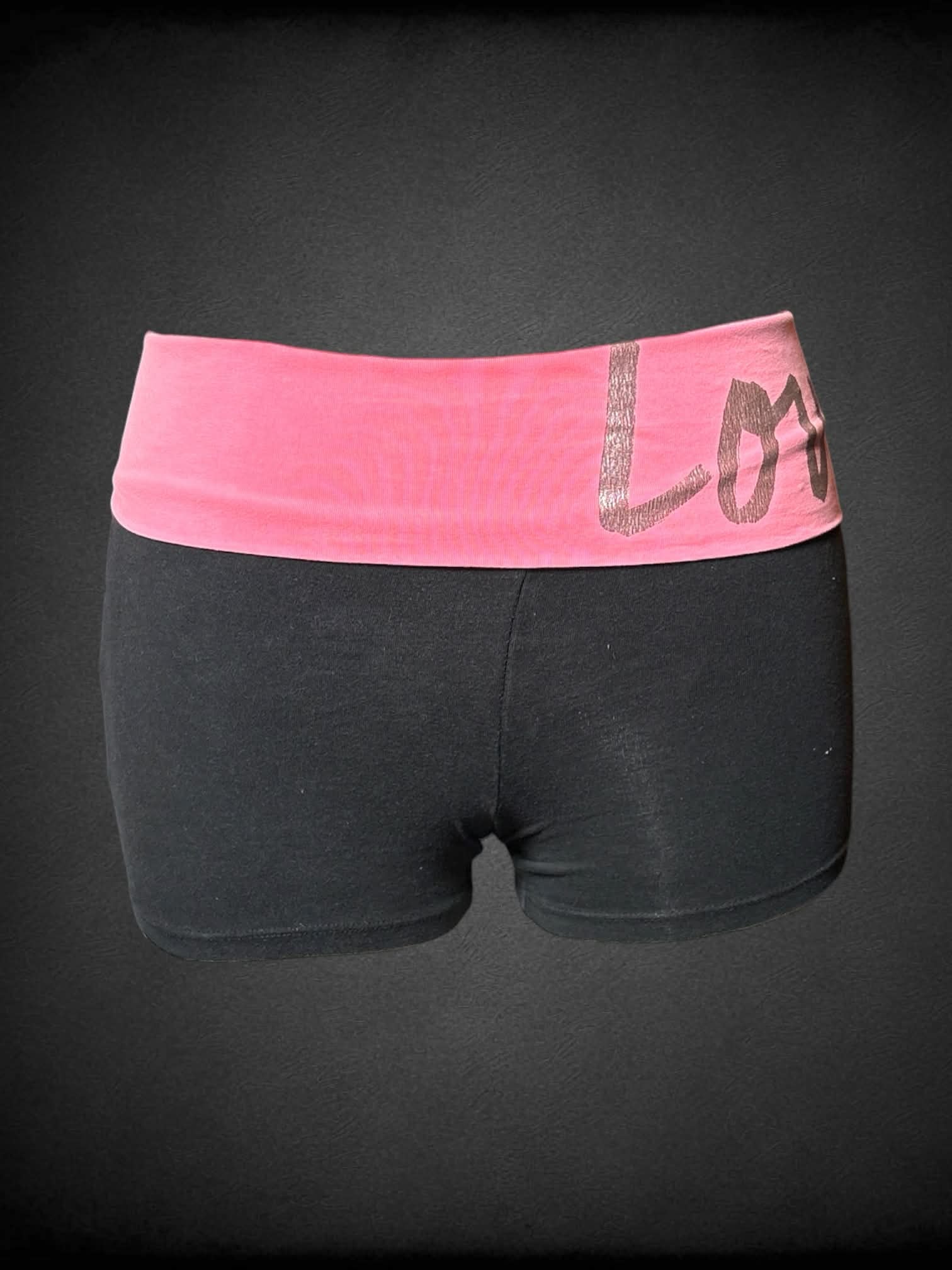 XL Victoria’s Secret black yoga shorts with pink waistband, and “Love Pink” written on the waistband