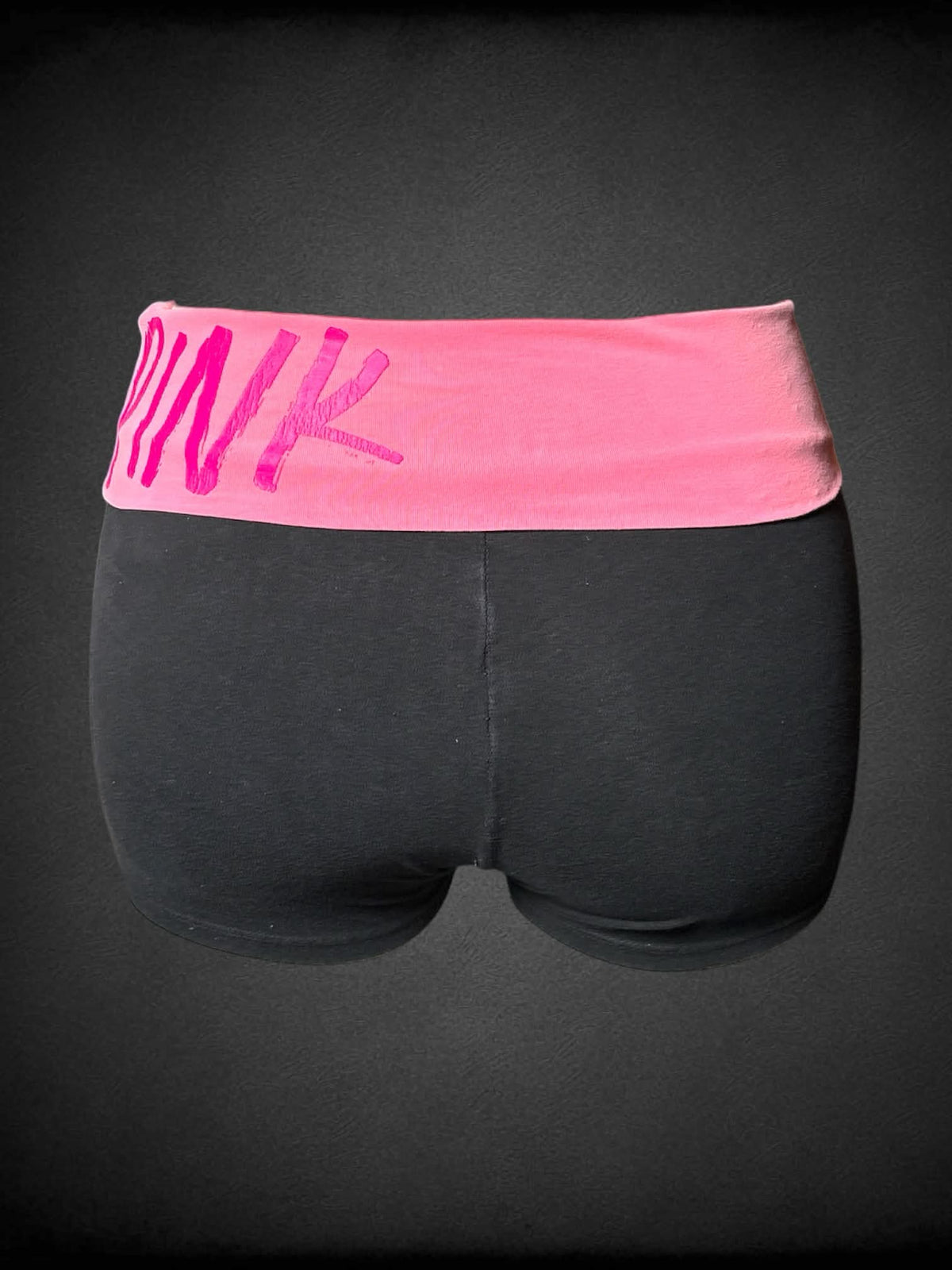 XL Victoria’s Secret black yoga shorts with pink waistband, and “Love Pink” written on the waistband