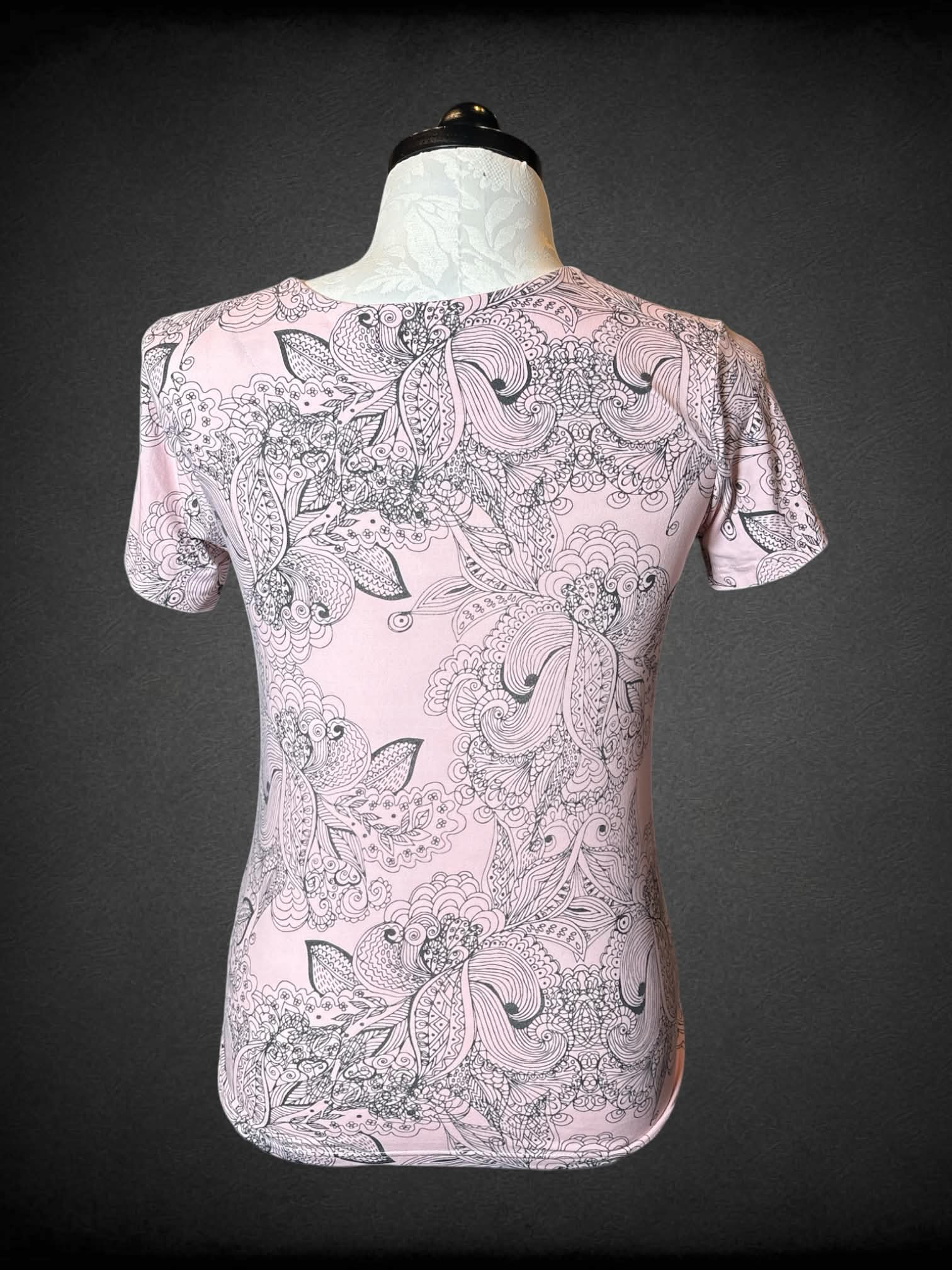 0X Joan Vass light pink soft t shirt with lace detailing and buttons on front, and black floral design