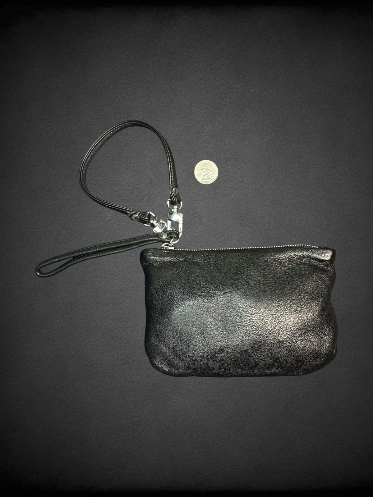Rough & Tumble black leather hand bag with zipper pocket