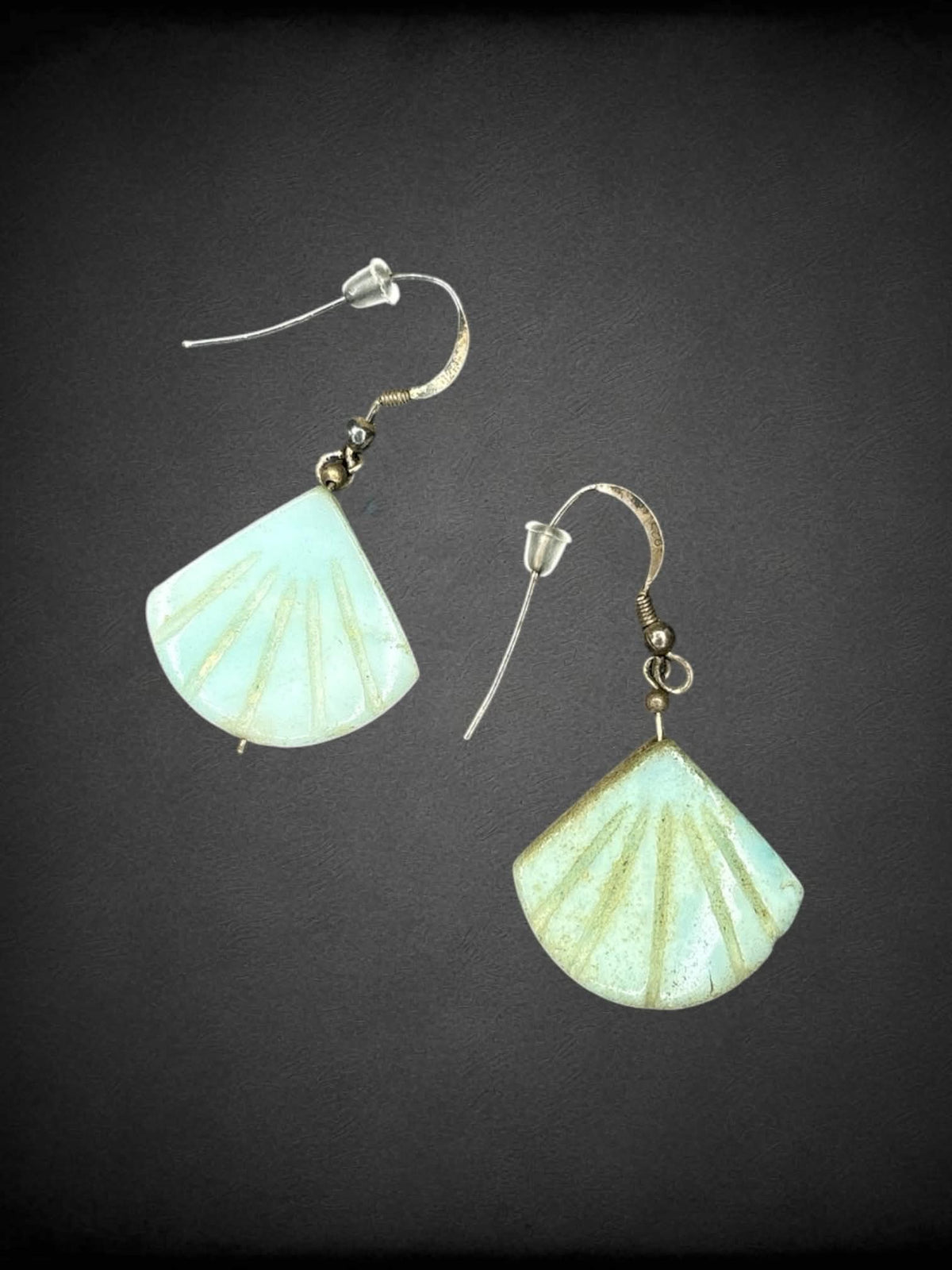 Silver earrings with blue stone clam shell charms