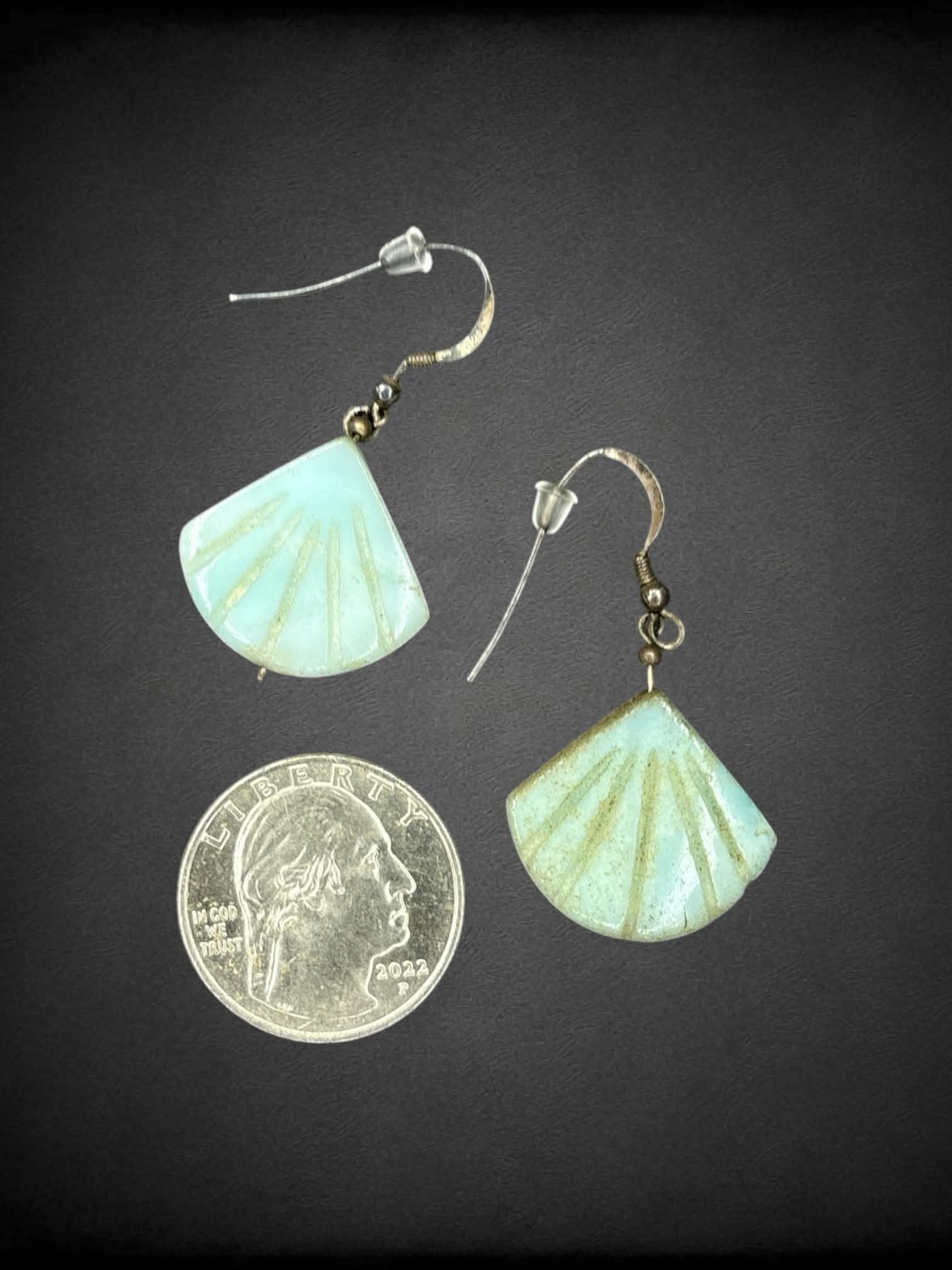 Silver earrings with blue stone clam shell charms