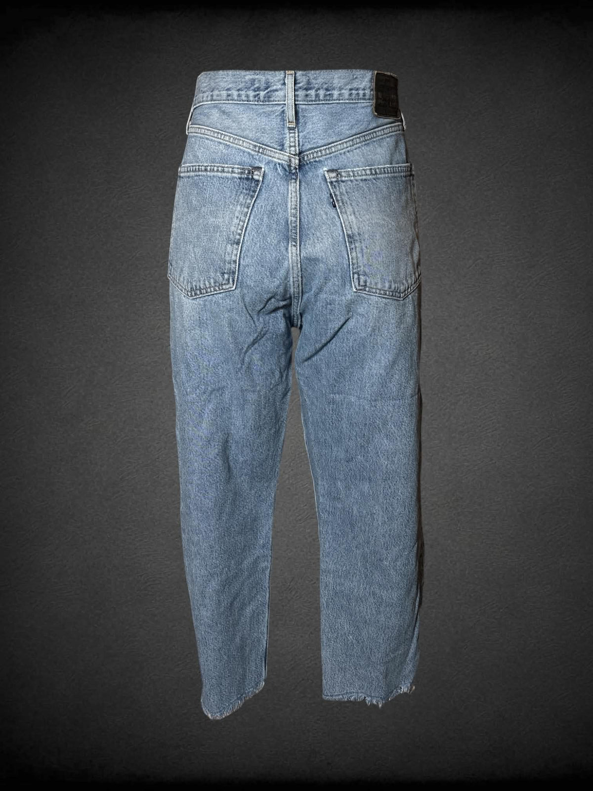 L Levi’s light blue high-waisted barrel cropped jeans with distressed hem