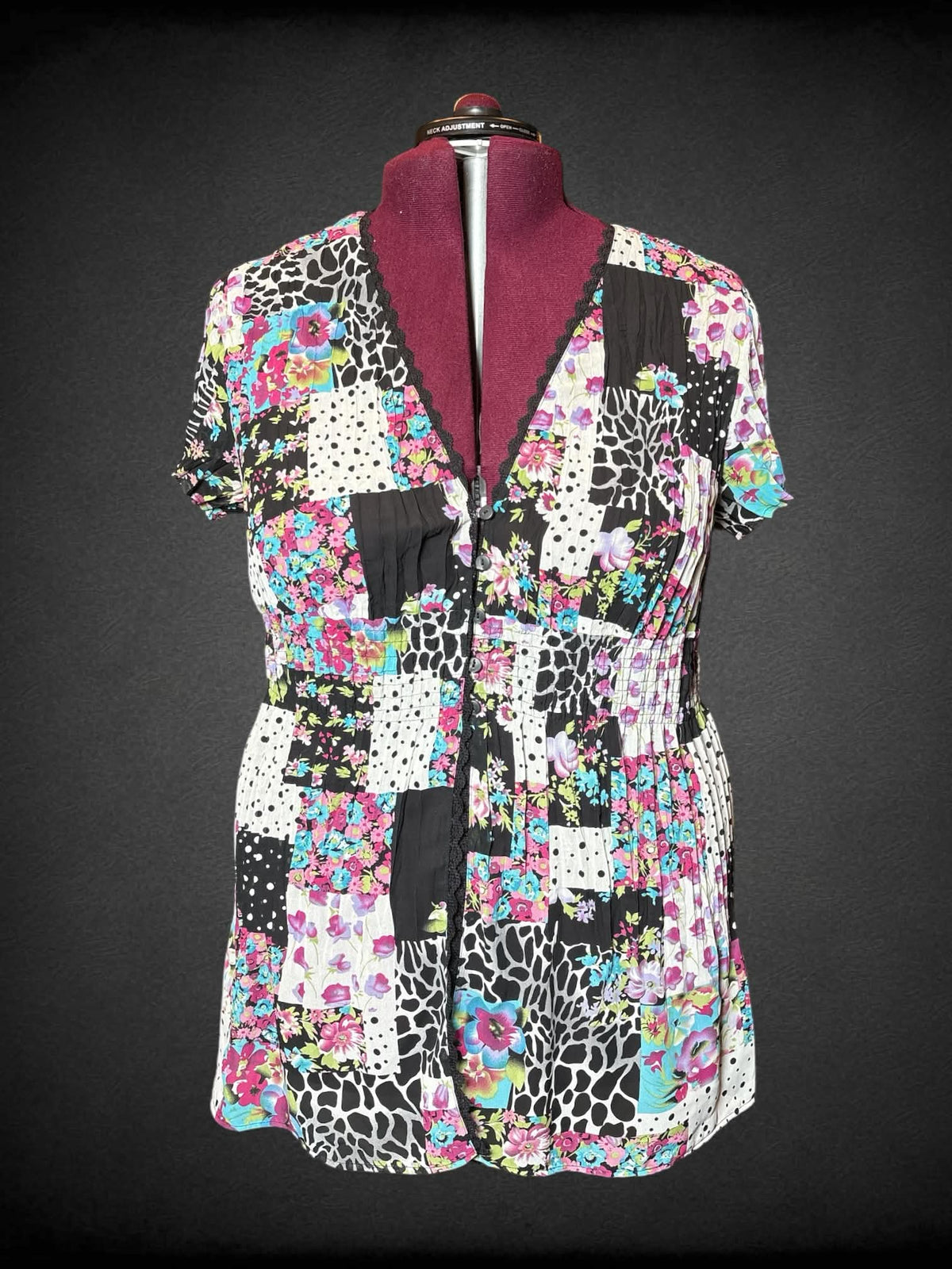2X Notations Y2K white sheer pleated flowy blouse with colorful “quilt-like” floral and polka dot designs, shirred waist, and buttons on front