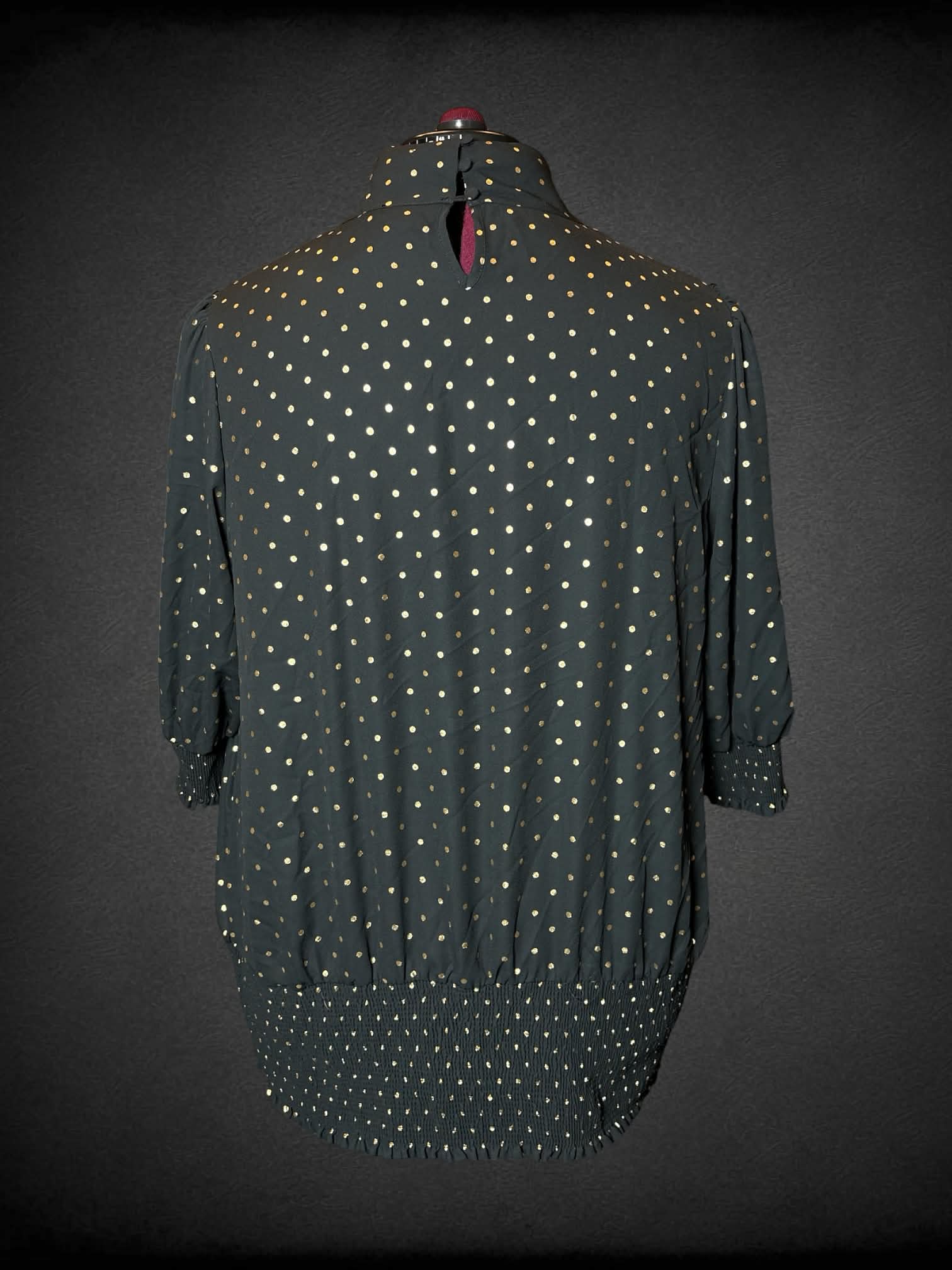 3X June + Vie black turtleneck blouse with gold polka-dot pattern, and shirred hem